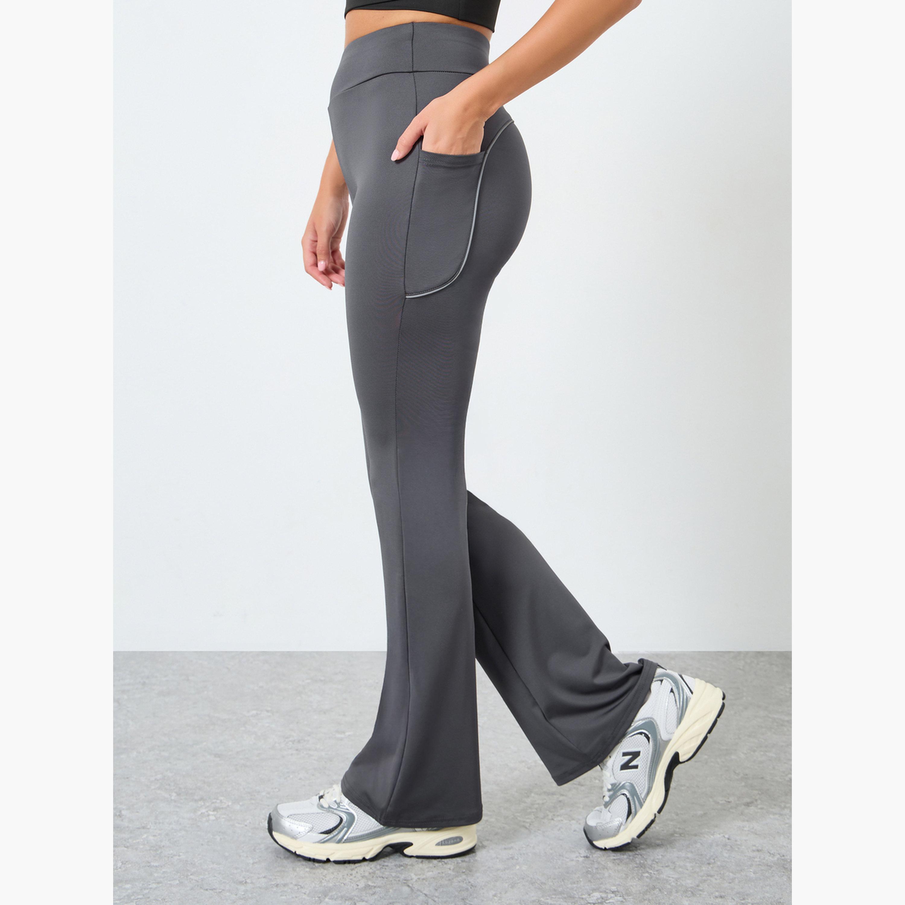 Styli Back Single Reflective Strip Pocket Detail Flared Leggings-women-clothing-sportswearandactivewear-bottoms-leggings-image-1
