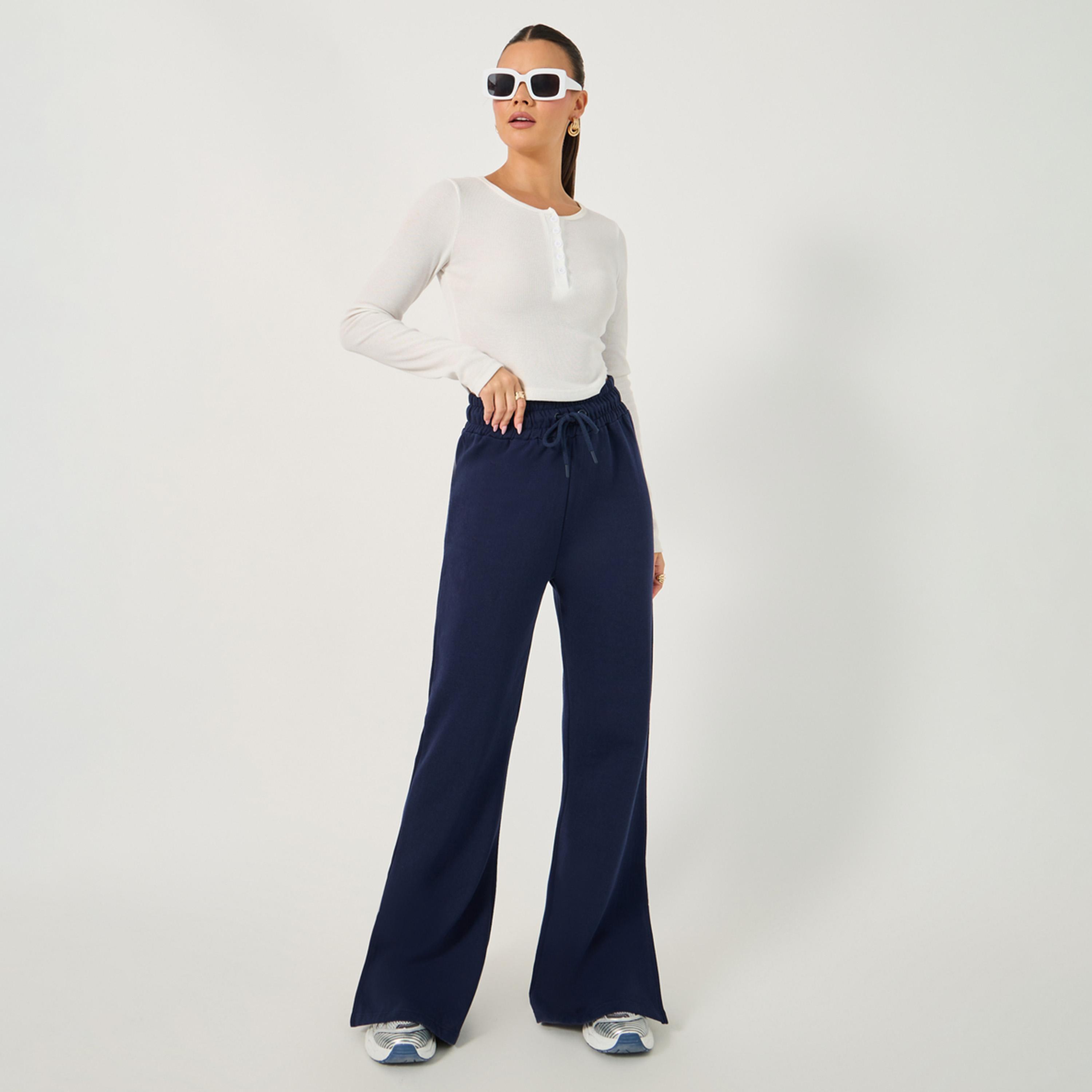 Styli Solid Drawstring Waist Flared Joggers with Side Slit-women-clothing-bottoms-joggers-image-1