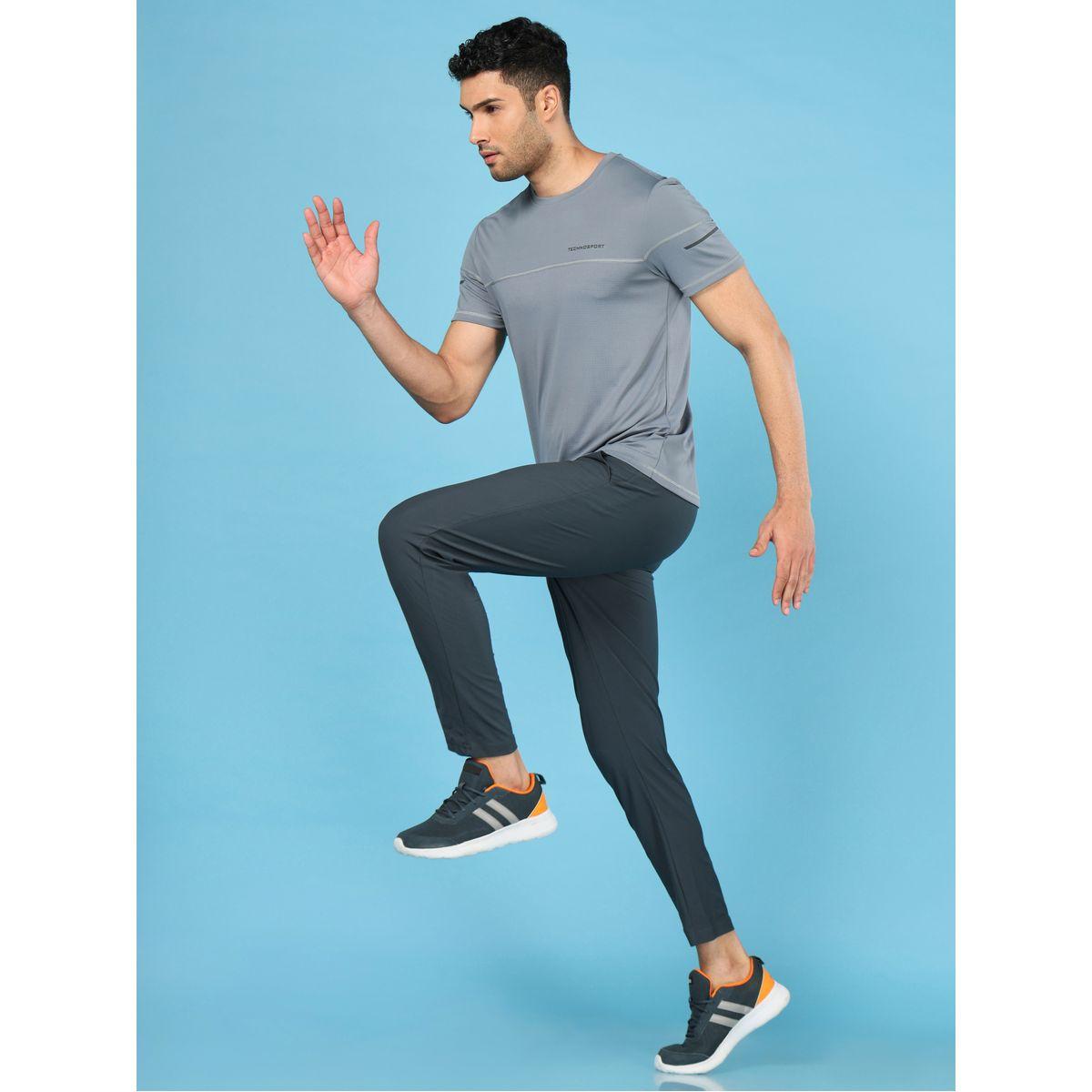 تيشيرت بقصة سليم فت وتداخلات خياطة تكنوسبورت × ستايلي-men-clothing-sportswearandactivewear-tshirtsandpolos-image-4