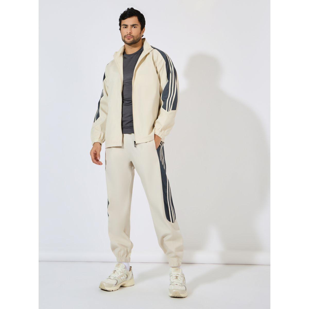 بدلة رياضية بتداخلات مخططة وسحَّاب غلق-men-clothing-sportswearandactivewear-tracksuits-image-1