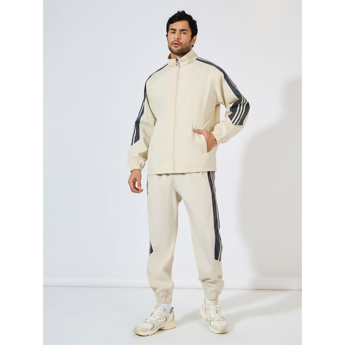 بدلة رياضية بتداخلات مخططة وسحَّاب غلق-men-clothing-sportswearandactivewear-tracksuits-image-3
