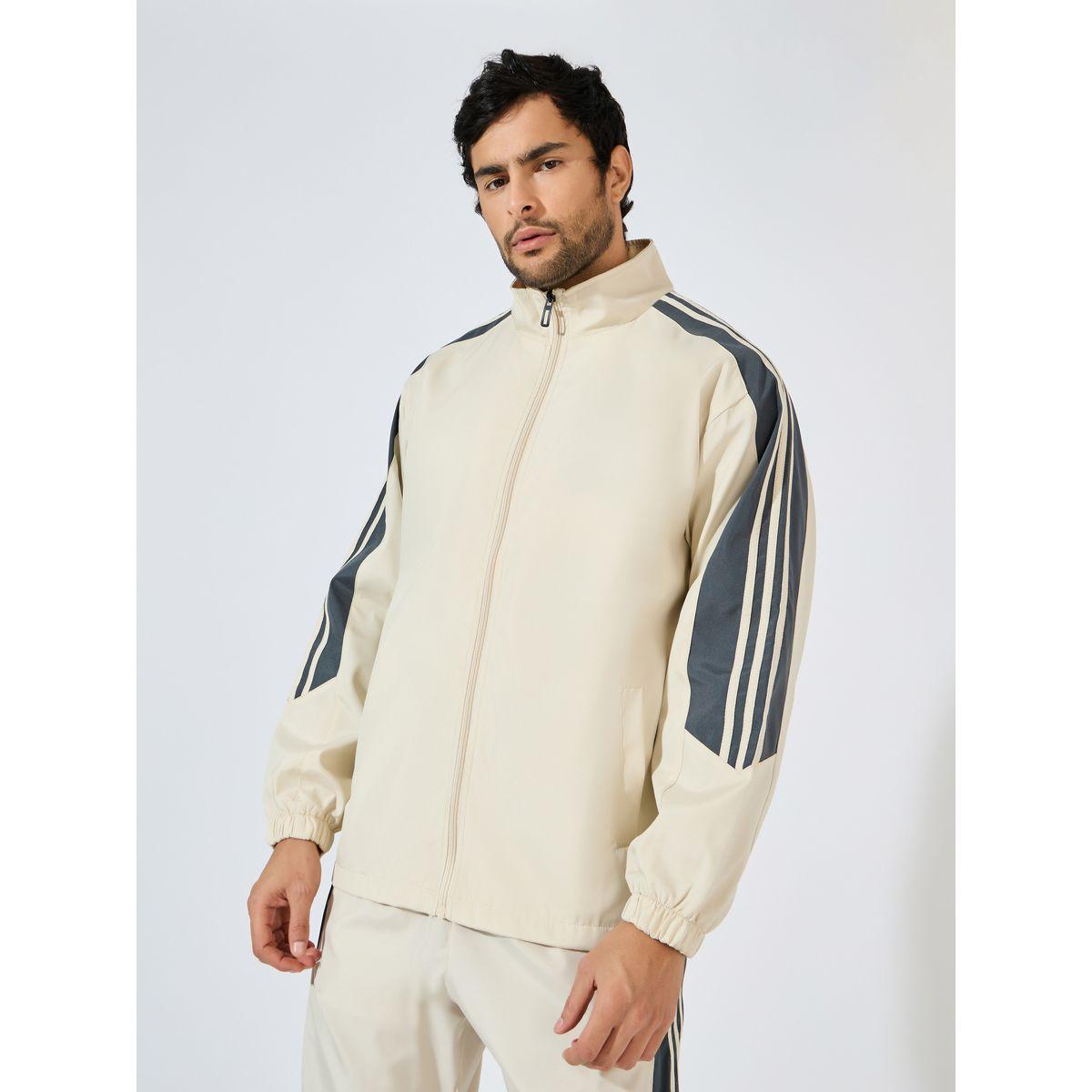 بدلة رياضية بتداخلات مخططة وسحَّاب غلق-men-clothing-sportswearandactivewear-tracksuits-image-4