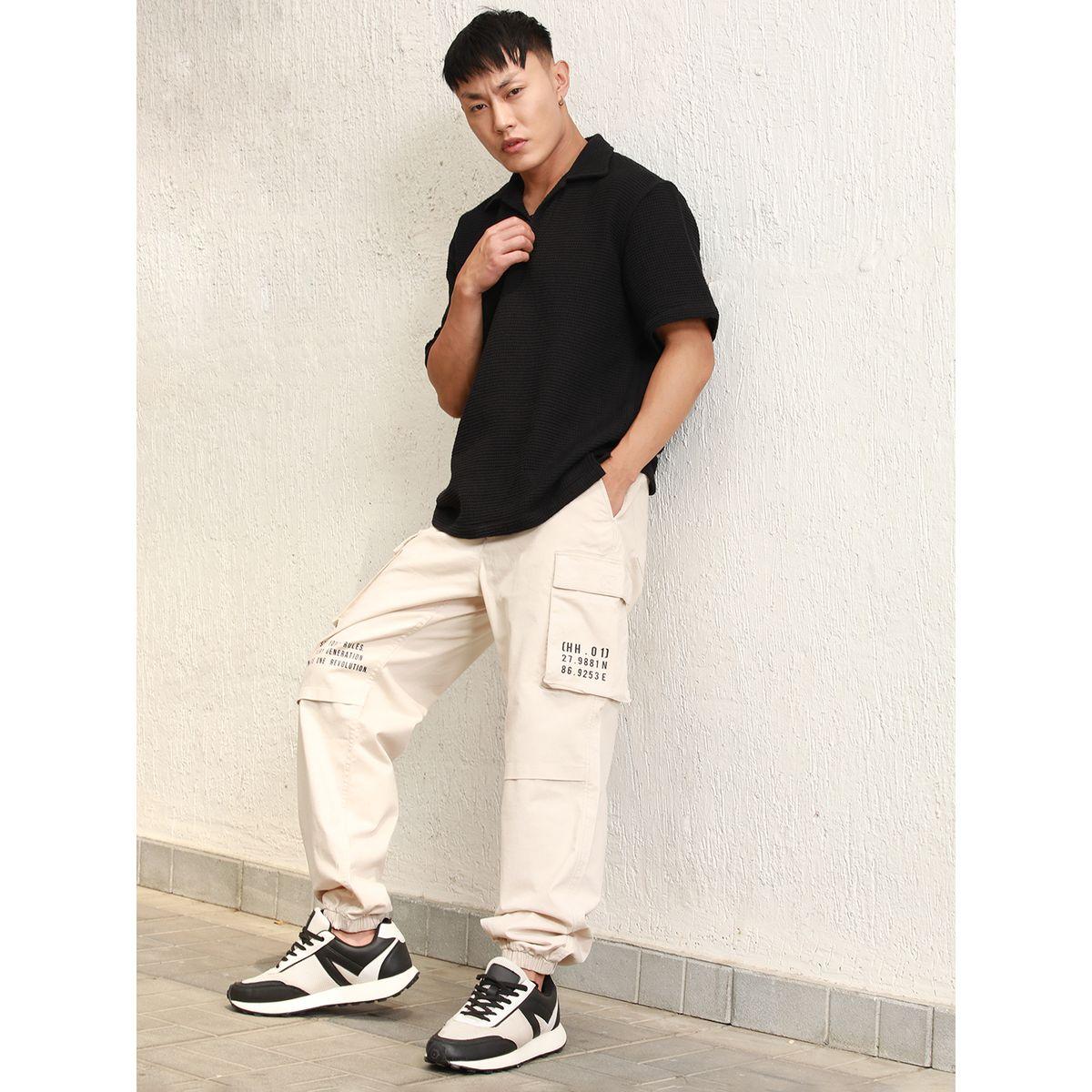 بنطال كارجو بقصة مريحة وجيب مطبع هابر هولم × ستايلي-men-clothing-bottoms-joggers-image-5