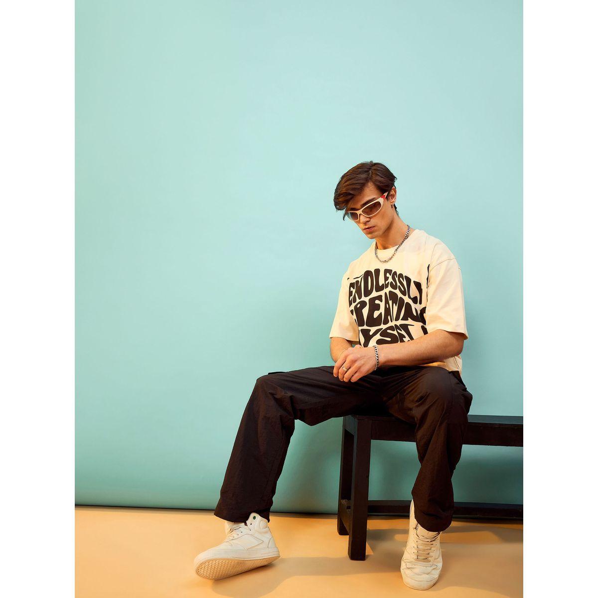 تيشيرت فضفاض مطبع بكتابة ماسكلن ساسافراس × ستايلي-men-clothing-tshirtsandpolos-tshirts-image-6