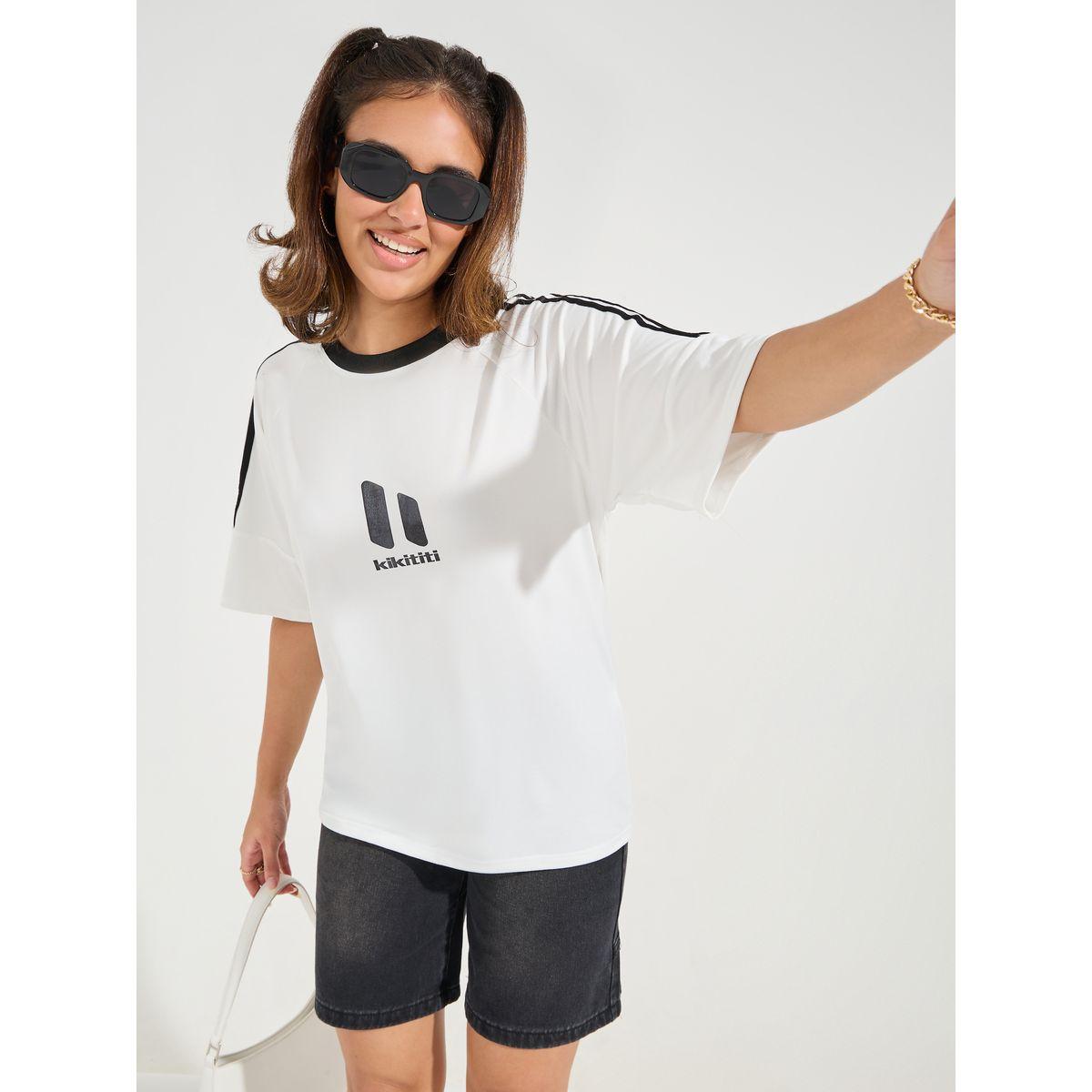 تيشيرت فضفاض باشرطة جانبية مع تفاصيل مُتباينة-women-clothing-tshirts-image-3