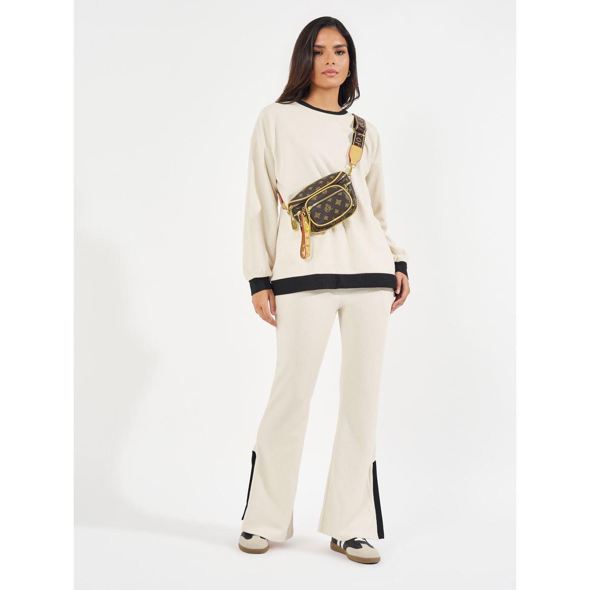 طقم منسق من جوغر واسع وبلوزة فضفاضة بتفاصيل محبوكة-women-clothing-coordsets-image-1