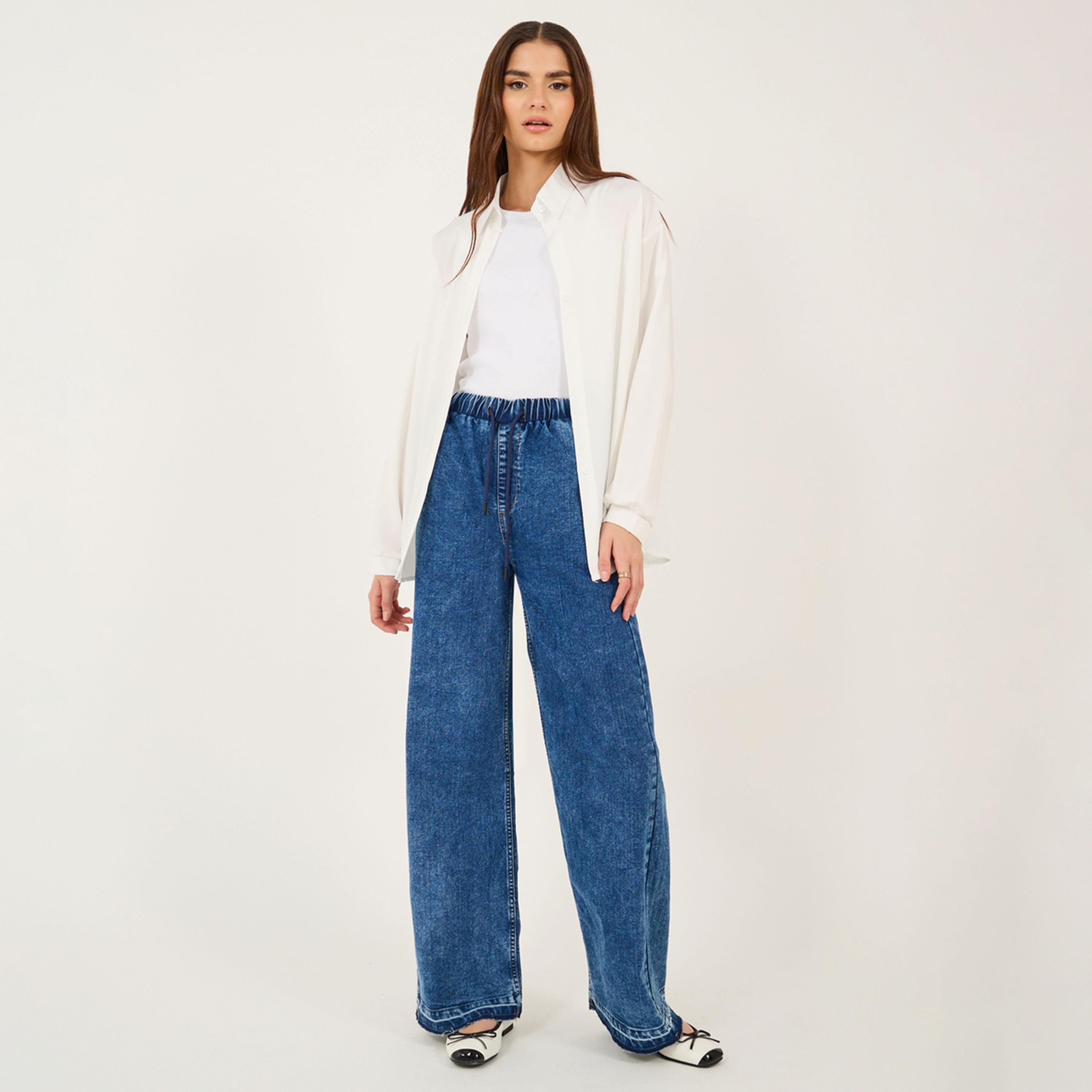 ستايلي - بنطال جينز واسع الساق بخصر مطاطي مرتفع مع حاشية منسلة-women-clothing-bottoms-jeans-image-1