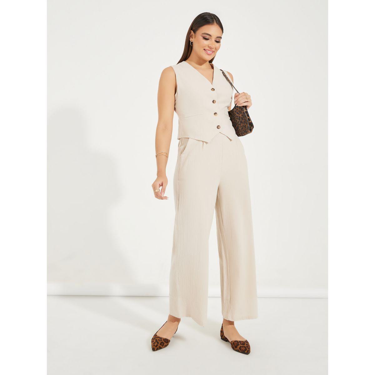 طقم منسق من بنطال بارجل واسعة مع جيليه بلا اكمام-women-clothing-coordsets-image-1