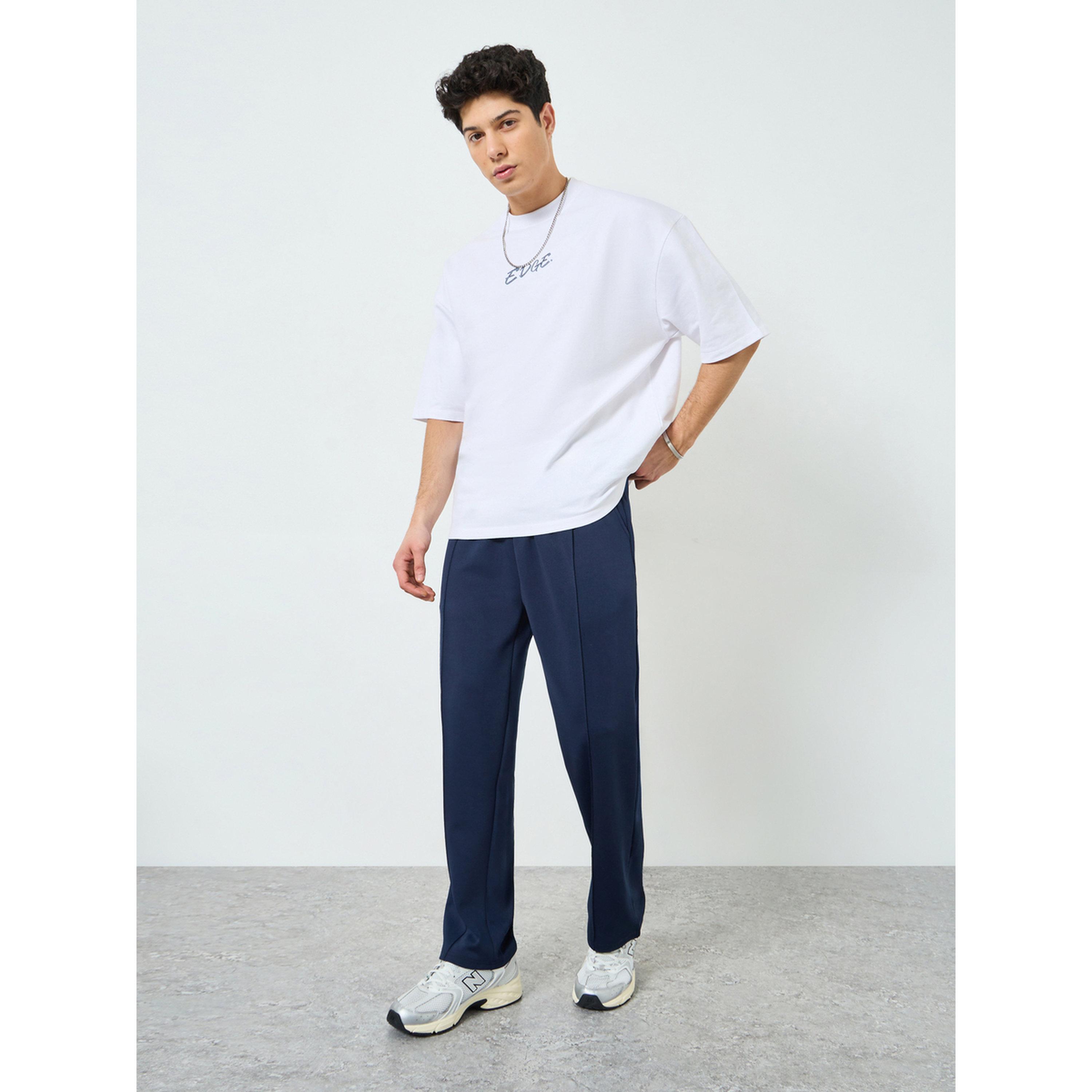 جوغر بقصة مريحة وحافة مفتوحة ودرزات-men-clothing-bottoms-joggers-image-2