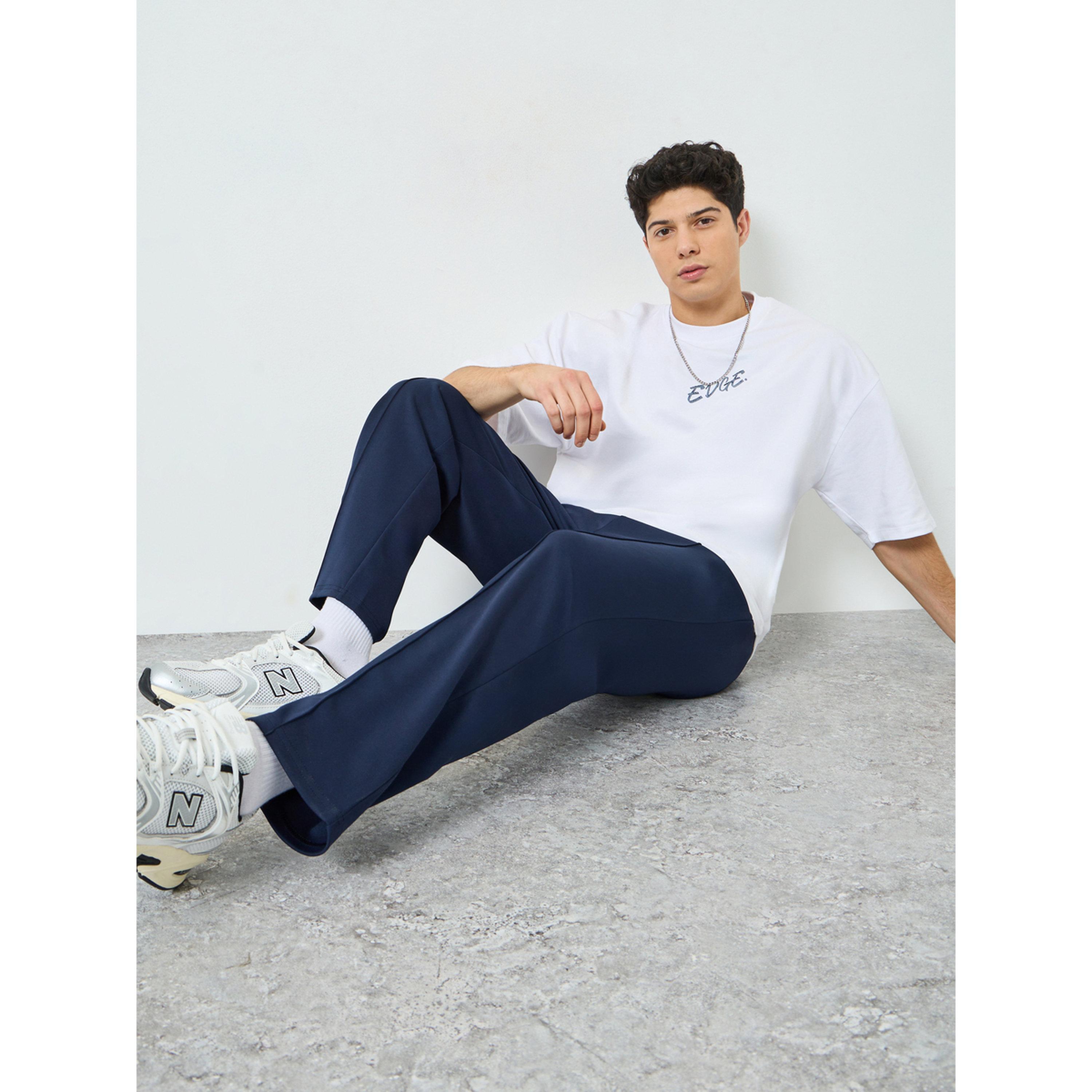 جوغر بقصة مريحة وحافة مفتوحة ودرزات-men-clothing-bottoms-joggers-image-3