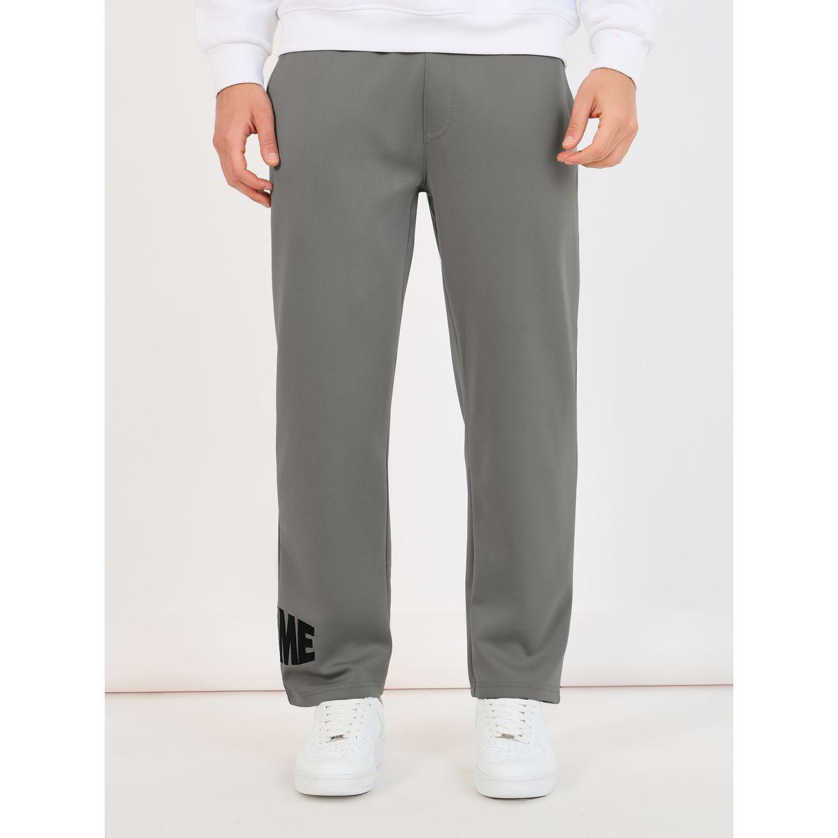 جوغر بقصة مريحة وتفاصيل مُطرّزة-men-clothing-bottoms-joggers-image-3