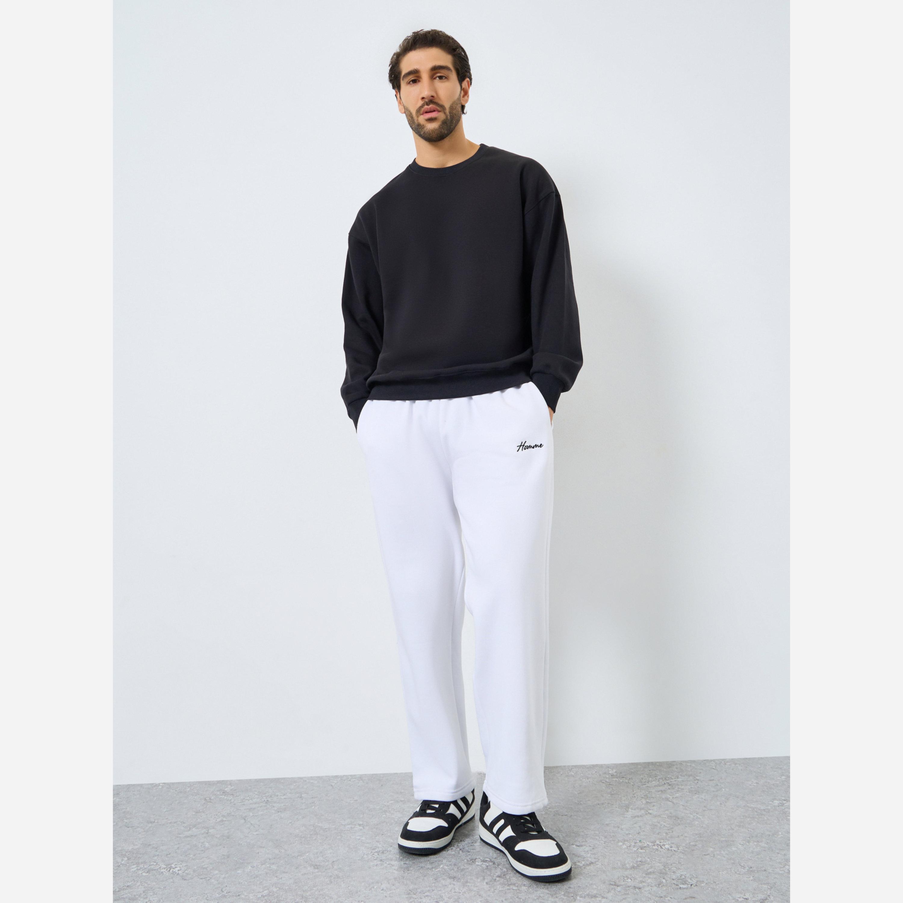 ستايلي - بنطال رياضي رجالي مطرز مفتوح من الأسفل-men-clothing-bottoms-joggers-image-2