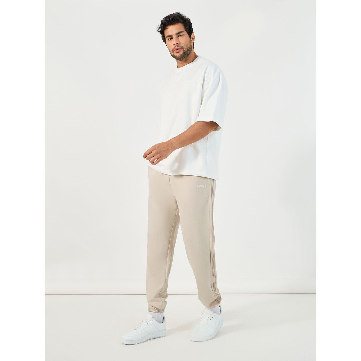 جوغر فضفاض بتفاصيل حزوز جانبية-men-clothing-bottoms-joggers-image-2