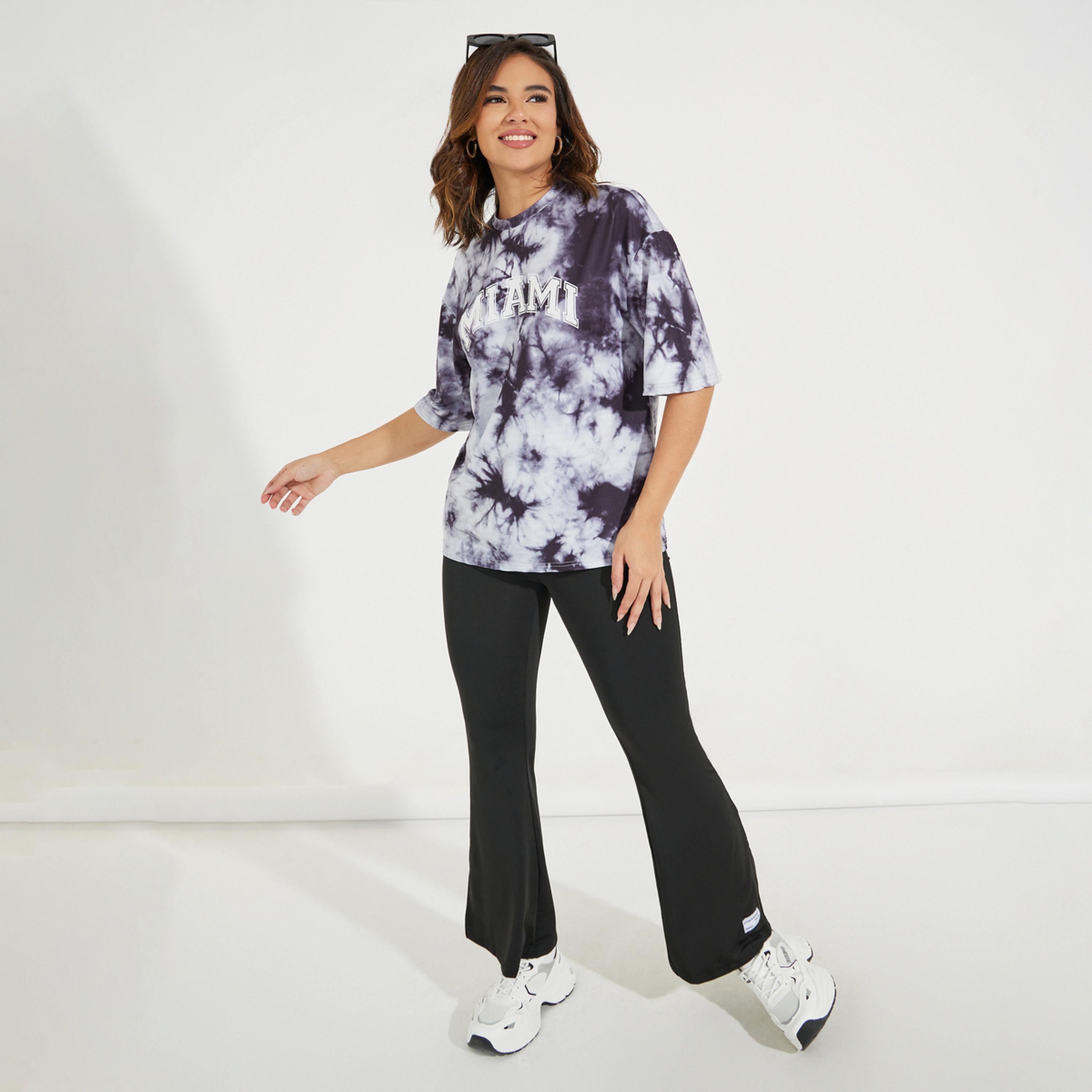 مجموعة من بنطال واسع مع تيشيرت بطبعة مصبوغة-women-clothing-coordsets-image-1