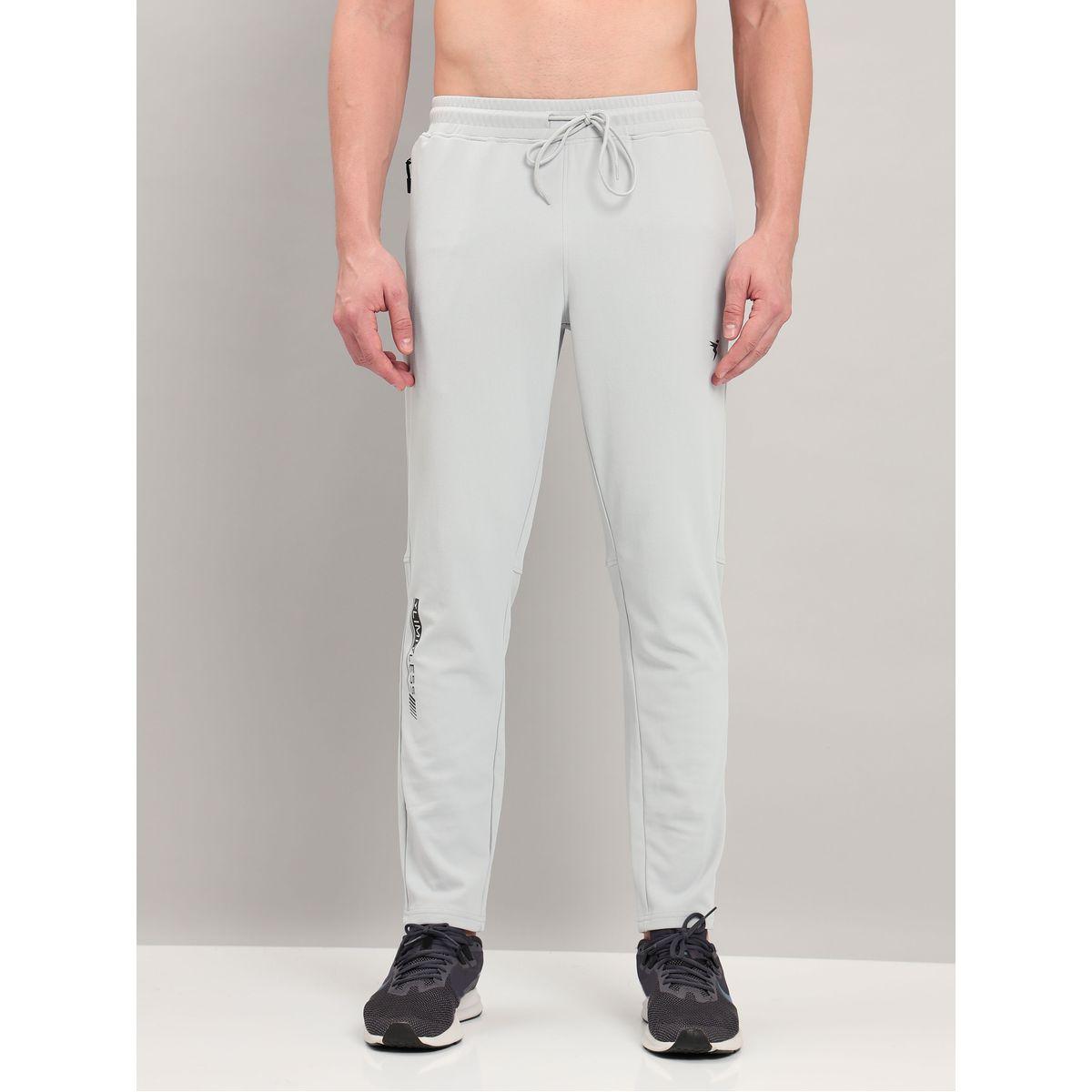 بنطال رياضي سادة بقصة سليم فت تكنوسبورت × ستايلي-men-clothing-sportswearandactivewear-bottoms-image-1