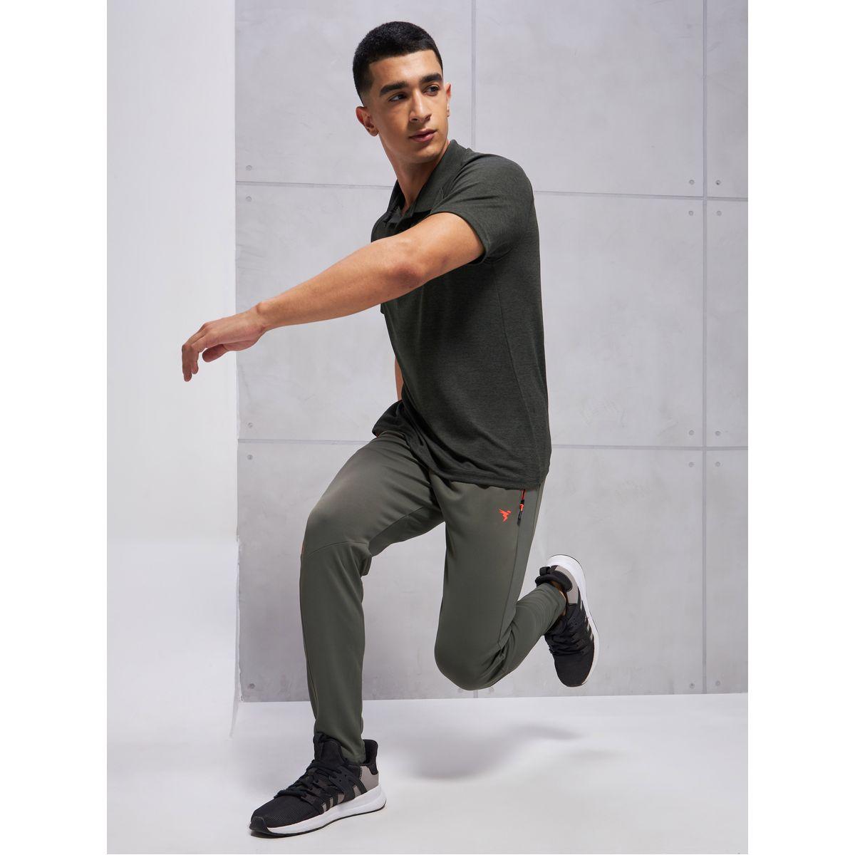 بنطال رياضي سادة بقصة سليم فت تكنوسبورت × ستايلي-men-clothing-sportswearandactivewear-bottoms-image-1