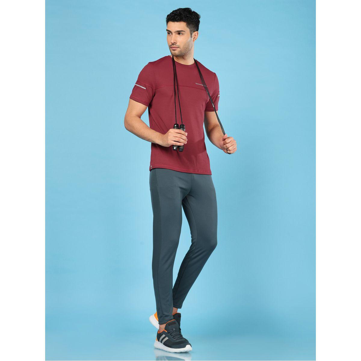 بنطال رياضي سادة بقصة سليم فت تكنوسبورت × ستايلي-men-clothing-sportswearandactivewear-bottoms-image-5