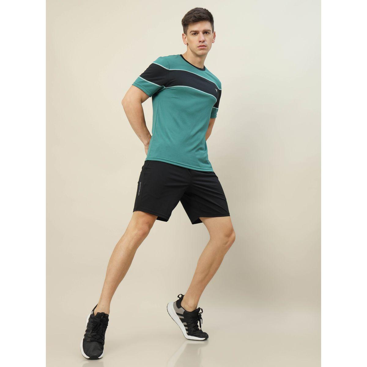 شورت سادة بقصة مريحة تكنوسبورت × ستايلي-men-clothing-sportswearandactivewear-bottoms-image-4