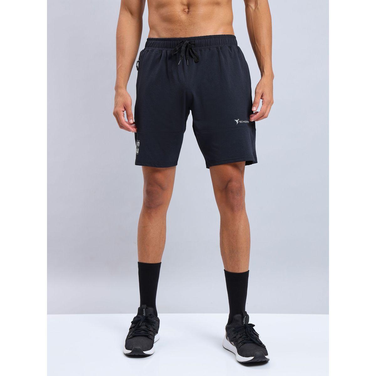 شورت بقصة مريحة ورباط خصر تكنوسبورت × ستايلي-men-clothing-sportswearandactivewear-bottoms-image-5