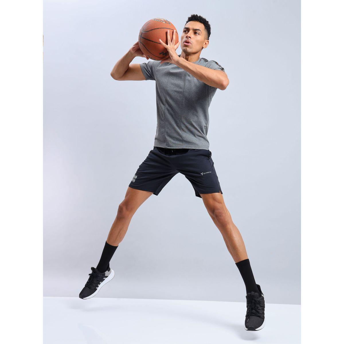 شورت بقصة مريحة ورباط خصر تكنوسبورت × ستايلي-men-clothing-sportswearandactivewear-bottoms-image-1