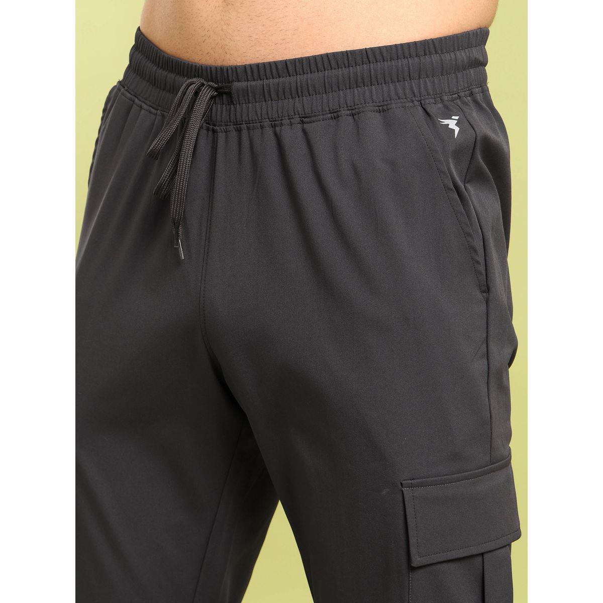 بنطال رياضي سادة بنمط كارجو وقصة مريحة تكنوسبورت × ستايلي-men-clothing-sportswearandactivewear-bottoms-image-4