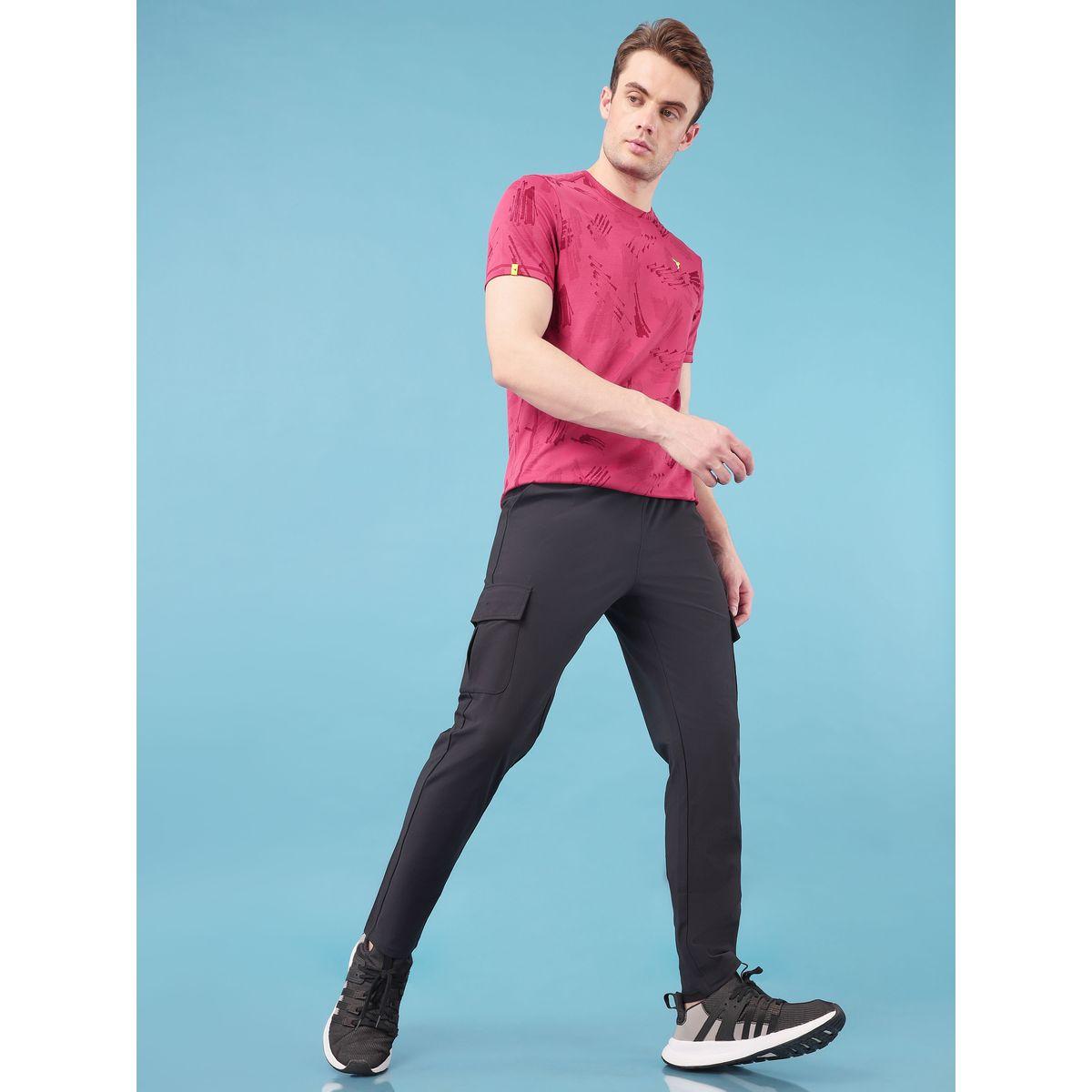 بنطال رياضي كارجو سادة بقصة مريحة تكنوسبورت × ستايلي-men-clothing-sportswearandactivewear-bottoms-image-1