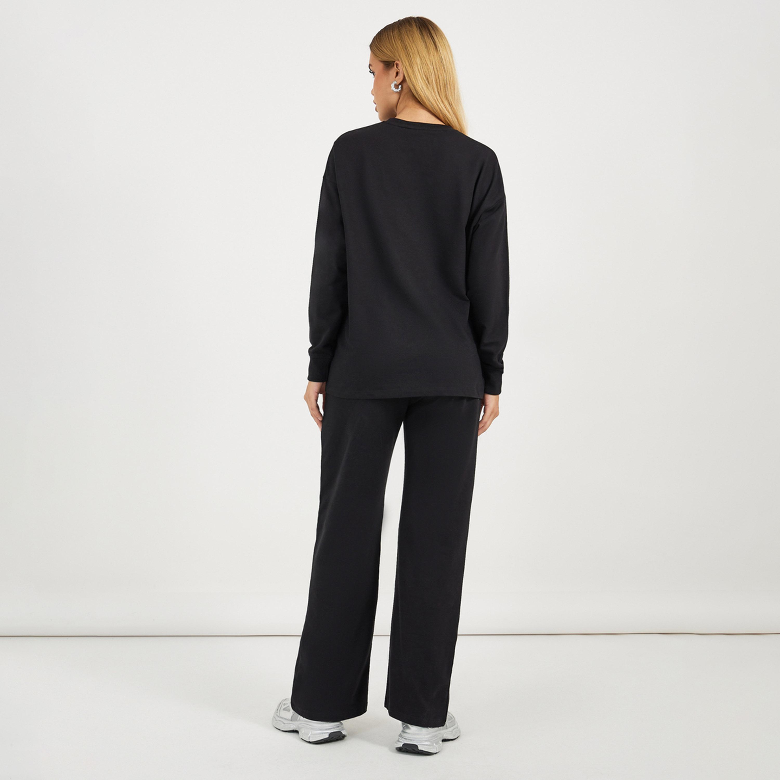 ستايلي-  طقم سويت شيرت طويل بحلقة خلفية مع بنطال رياضي واسع الساق-women-clothing-coordsets-image-6