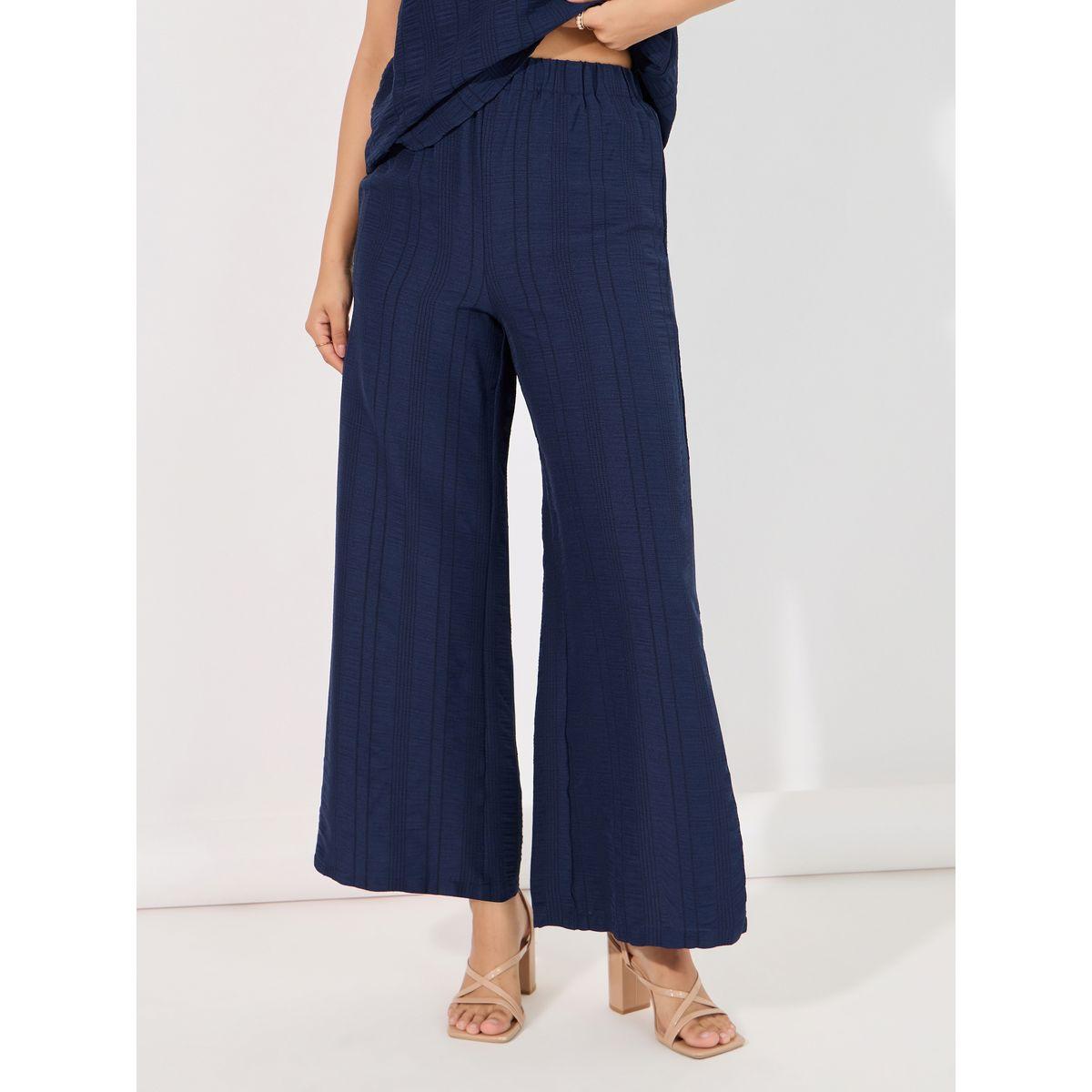 مجموعة من بنطال بأرجل واسعة مع بلوزة بتفاصيل بارزة الملمس-women-clothing-coordsets-image-5