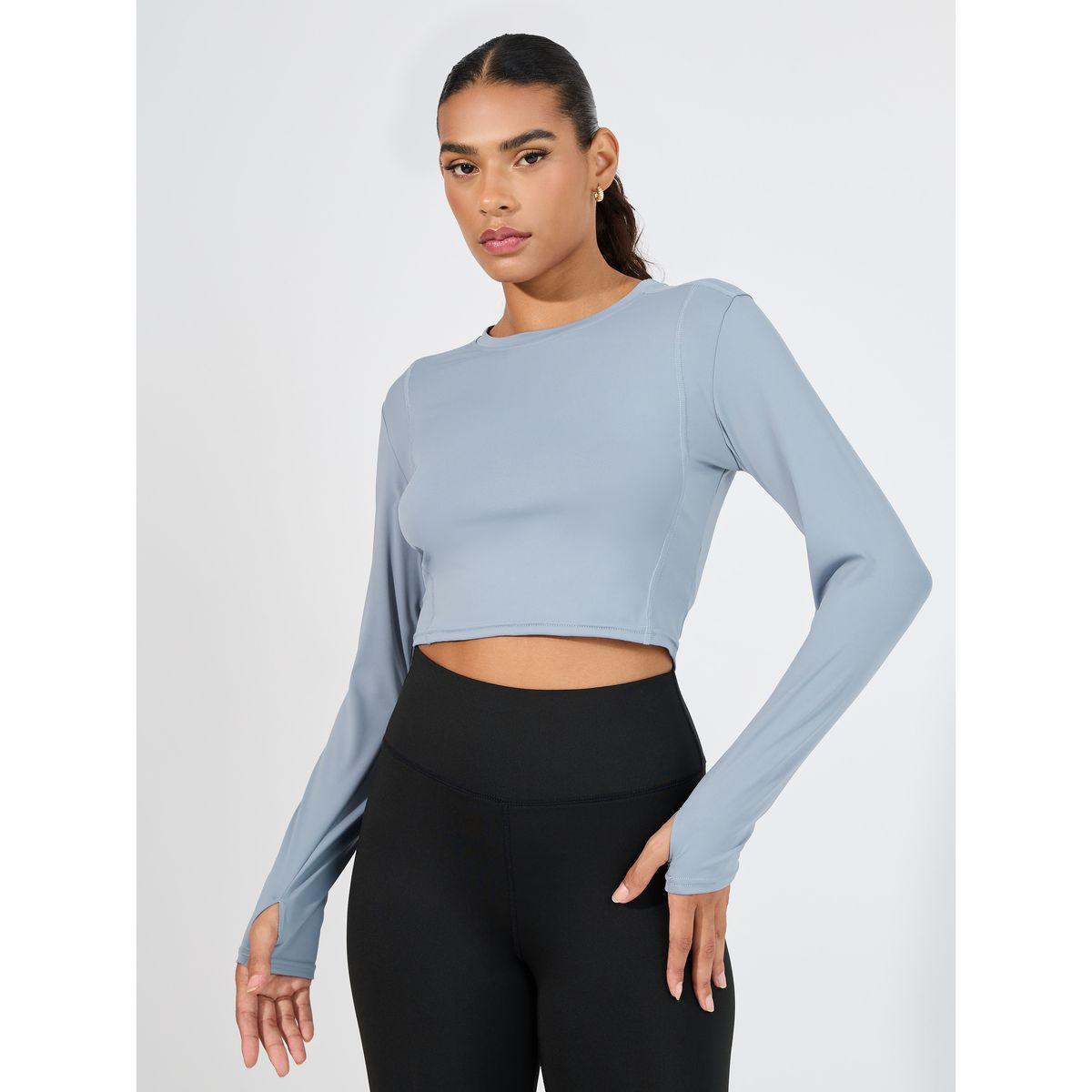 بلوزة قصيرة بتفاصيل مدروزة وأكمام طويلة-sports-women-clothing-tshirtsandvests-image-1