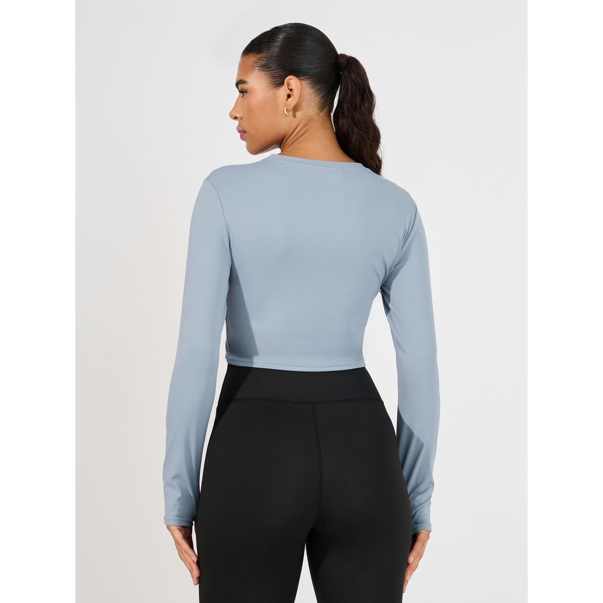 بلوزة قصيرة بتفاصيل مدروزة وأكمام طويلة-sports-women-clothing-tshirtsandvests-image-4