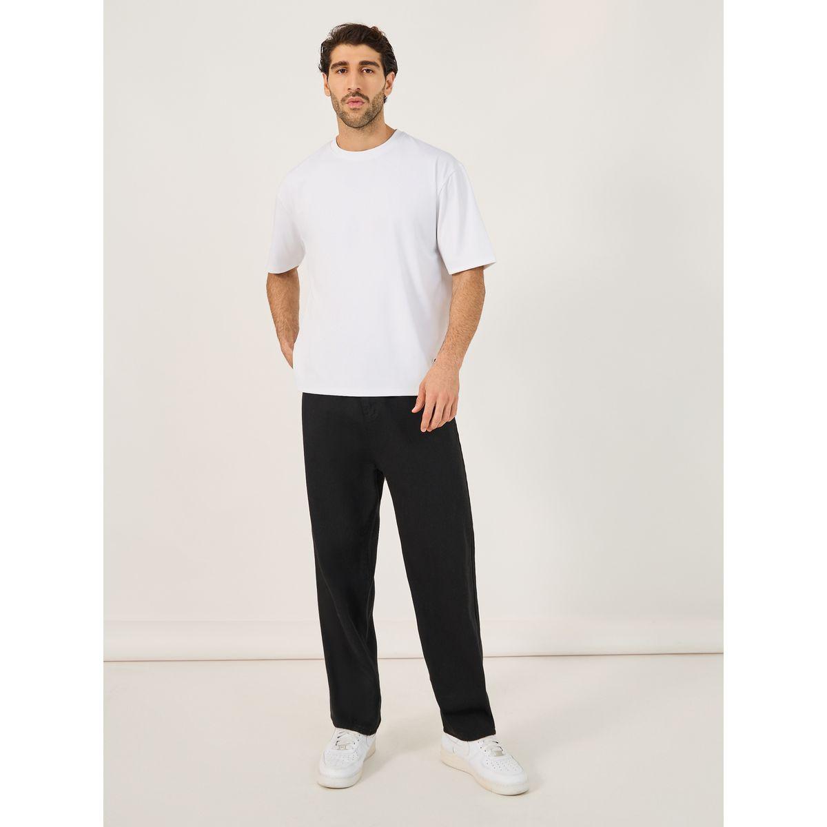 تيشيرت فضفاض بقطن سكوبا مزين بشارة-men-clothing-tshirtsandpolos-tshirts-image-2
