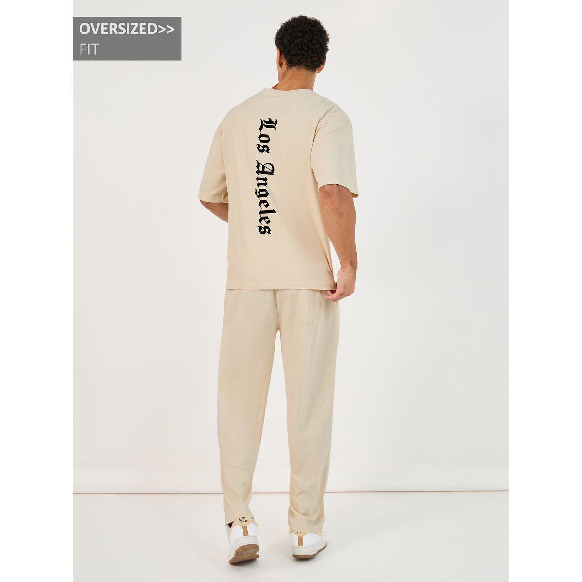 Styli Back Print Oversized T-Shirt and Open Hem Interlock Joggers Co-Ords-men-clothing-coordsets-image-1