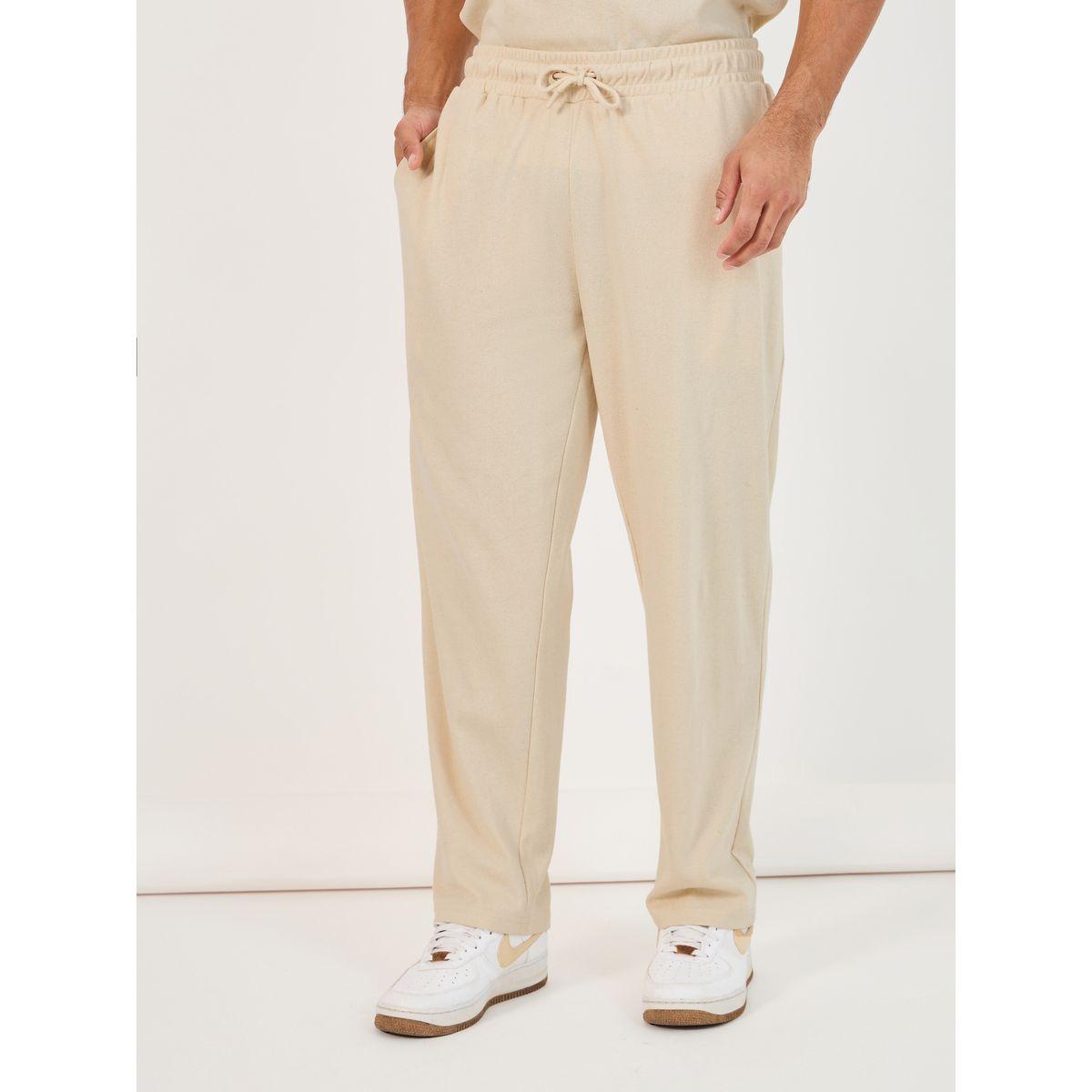 طقم منسق من جوغر وتيشيرت فضفاض بطبعة على الظهر-men-clothing-coordsets-image-6
