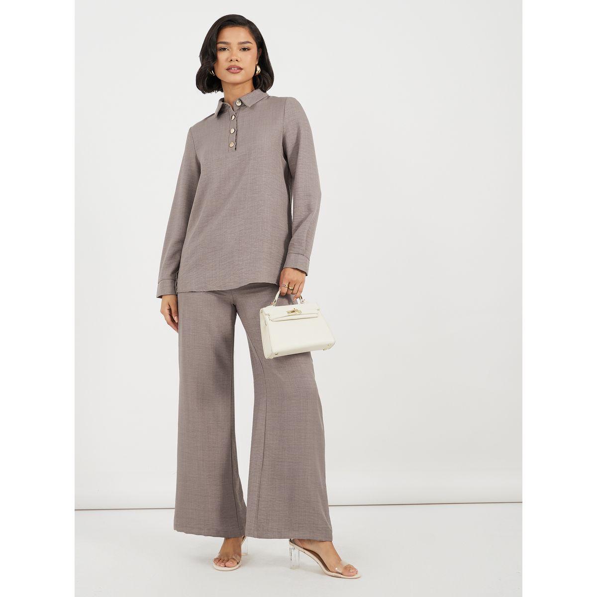 مجموعة من بنطال بأرجل واسعة وبلوزة طويلة بأزرار-women-clothing-coordsets-image-1