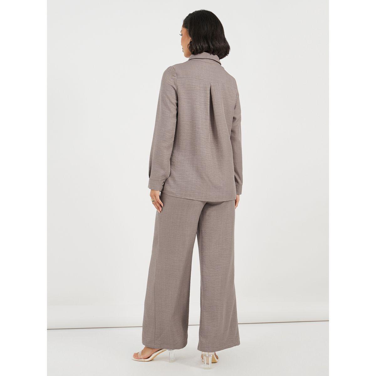 مجموعة من بنطال بأرجل واسعة وبلوزة طويلة بأزرار-women-clothing-coordsets-image-5