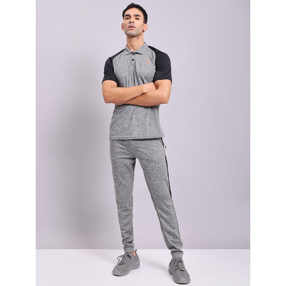 بنطال رياضي بنسيج ميلانج وقصة سليم فت تكنوسبورت × ستايلي-men-clothing-sportswearandactivewear-bottoms-joggers-image-4