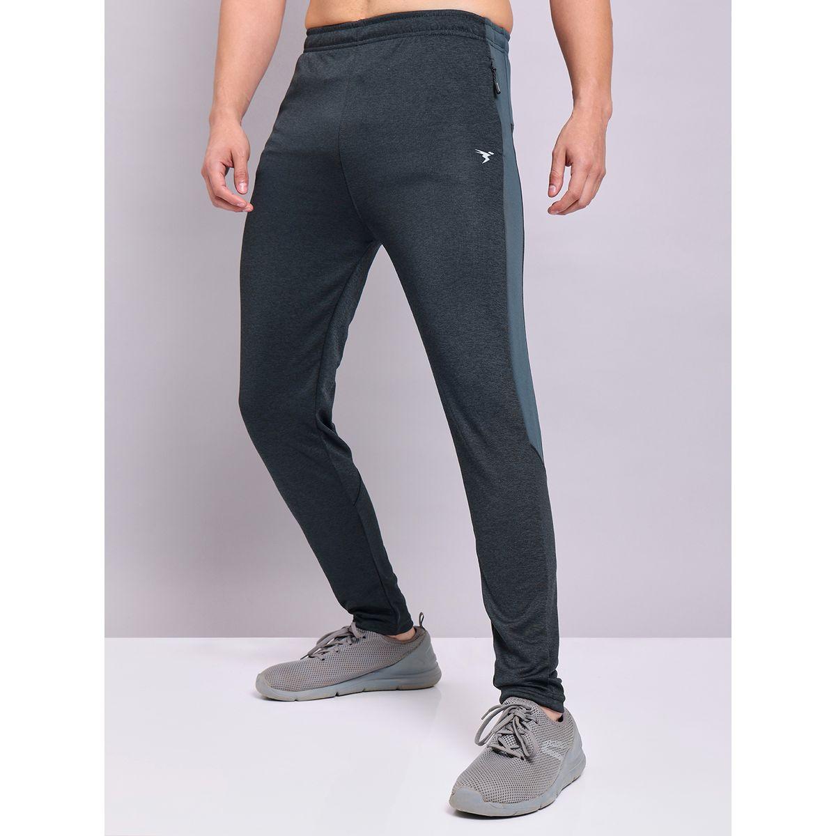 بنطال رياضي بنسيج ميلانج وقصة سليم فت تكنوسبورت × ستايلي-men-clothing-sportswearandactivewear-bottoms-joggers-image-1