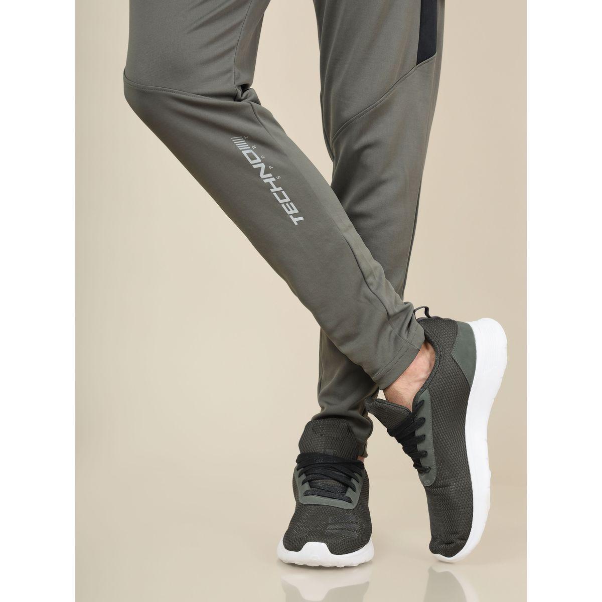 بنطال رياضي بقصة سليم فت وجيب بسحَّاب غلق تكنوسبورت × ستايلي-sports-men-clothing-bottoms-image-4