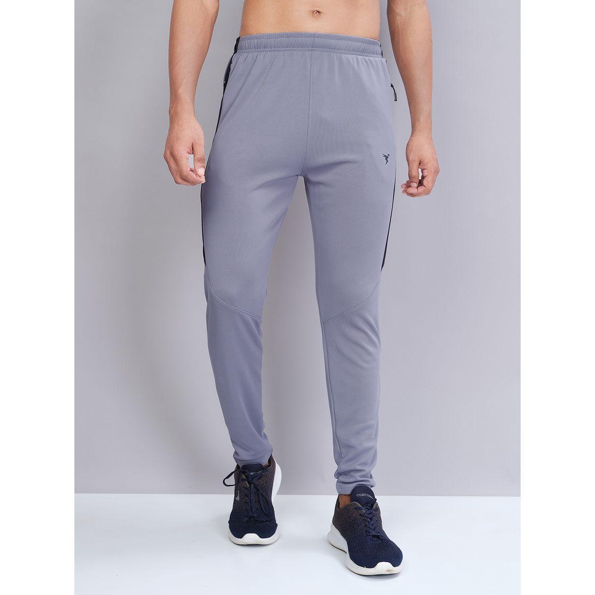 بنطال رياضي بقصة سليم فت وجيب بسحَّاب غلق تكنوسبورت × ستايلي-men-clothing-sportswearandactivewear-bottoms-joggers-image-1