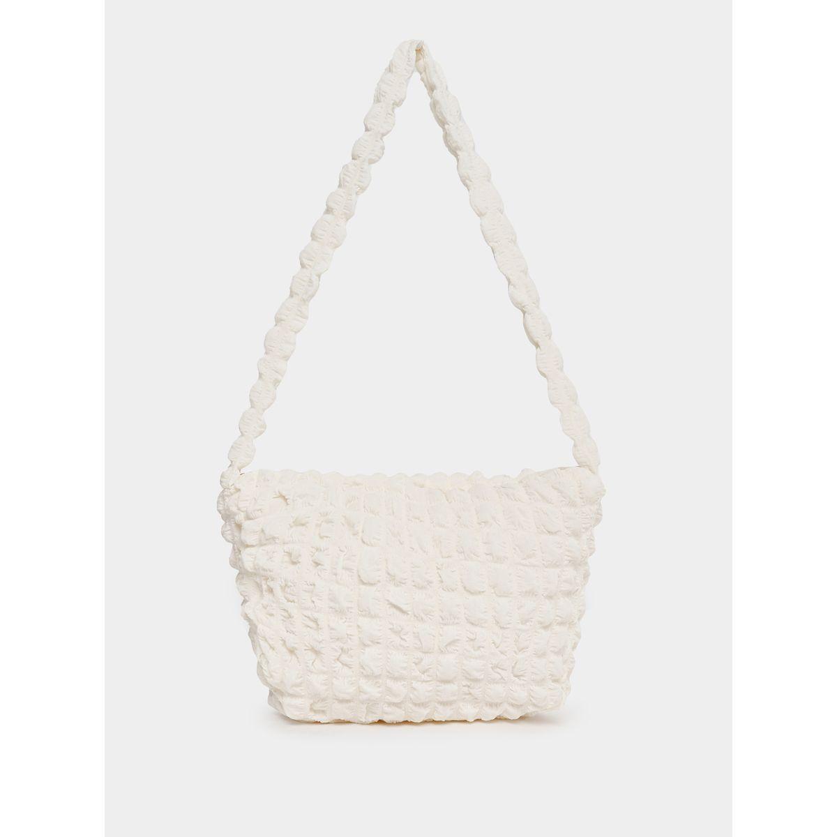 شنطة بتفاصيل بارزة الملمس وسحَّاب غلق-women-bagsandwallets-handbags-image-2