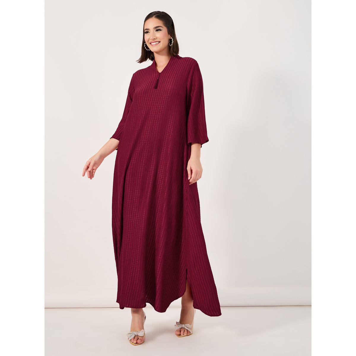 جلابية بتفاصيل بارزة الملمس وشُرّابة-women-arabicclothing-jalabiyas-image-1