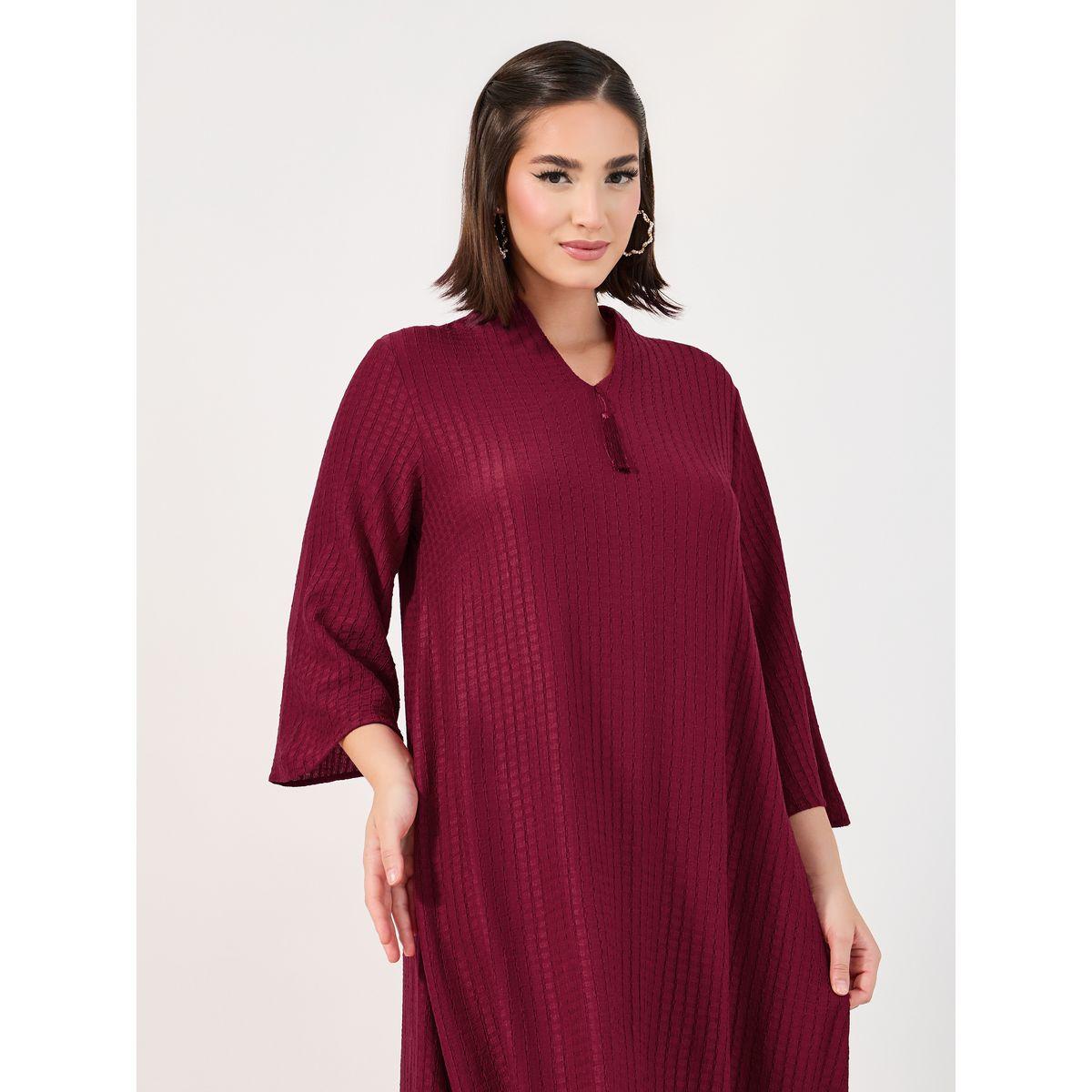 جلابية بتفاصيل بارزة الملمس وشُرّابة-women-arabicclothing-jalabiyas-image-2