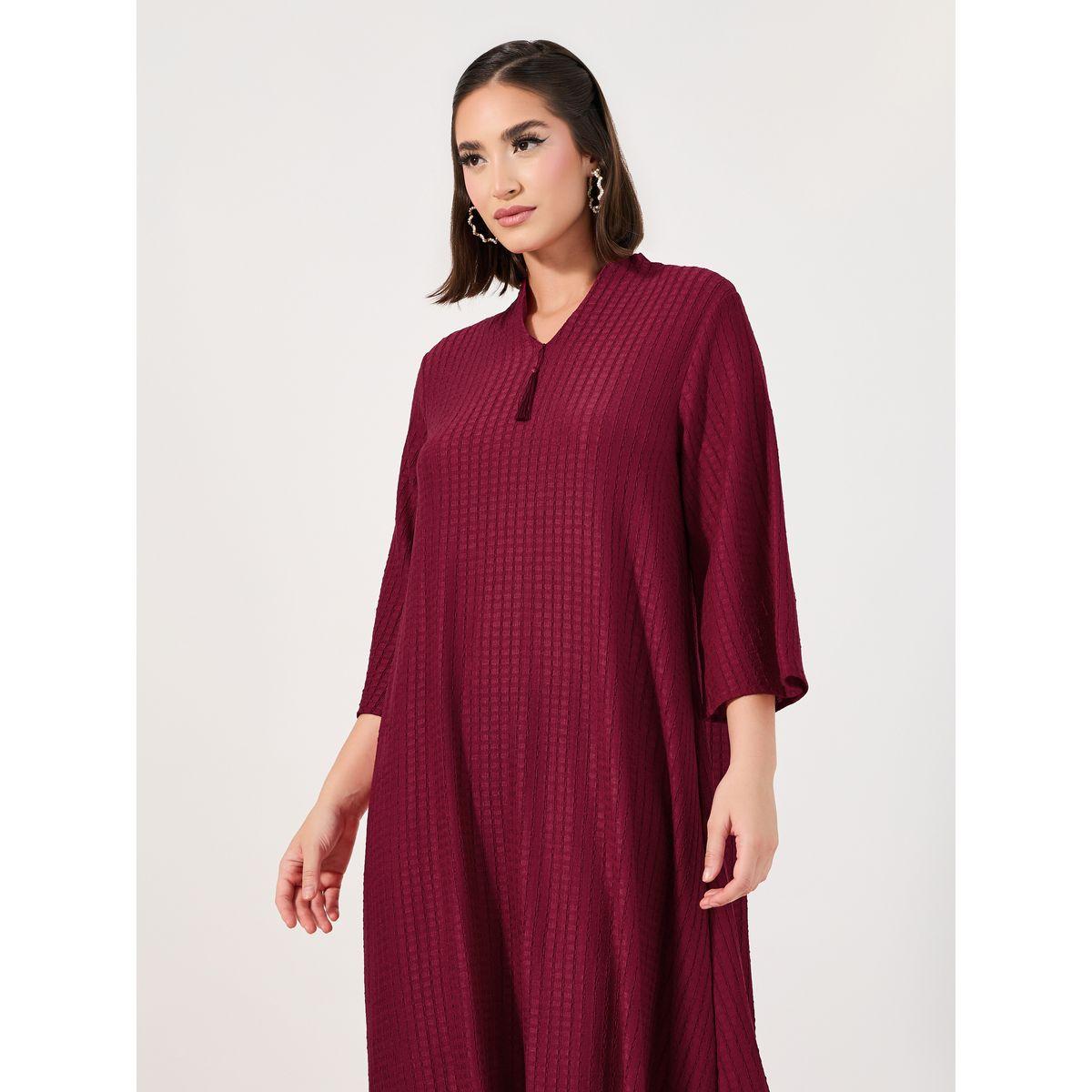 جلابية بتفاصيل بارزة الملمس وشُرّابة-women-arabicclothing-jalabiyas-image-5