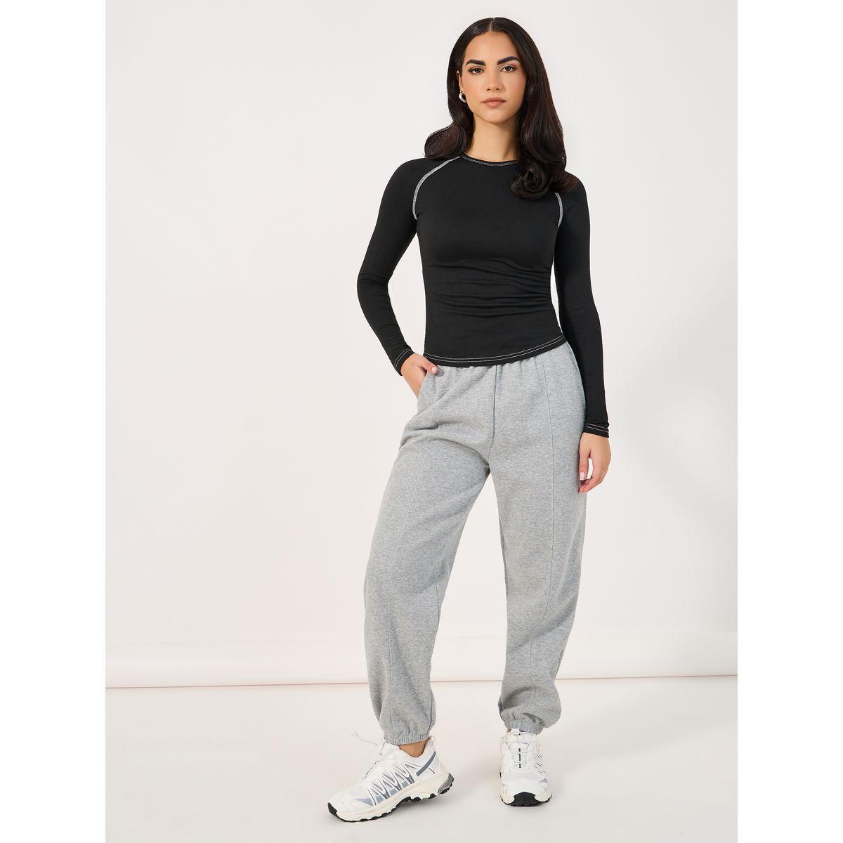 تيشيرت مُجسم بتفاصيل مدروزة وأكمام ريجلان-women-clothing-tshirts-image-3