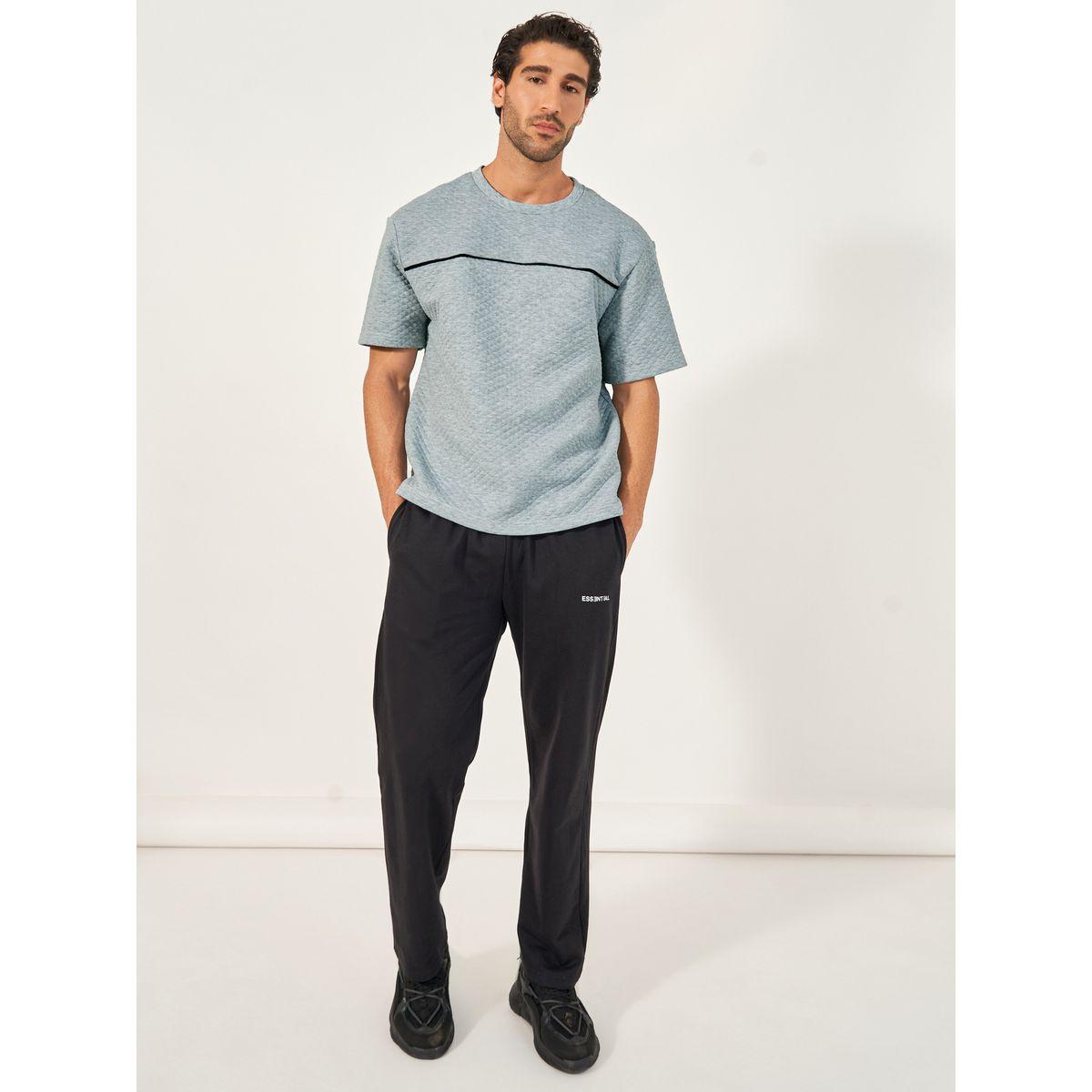 تيشيرت فضفاض بتداخلات محزوزة وأكمام قصيرة-men-clothing-tshirtsandpolos-tshirts-image-2