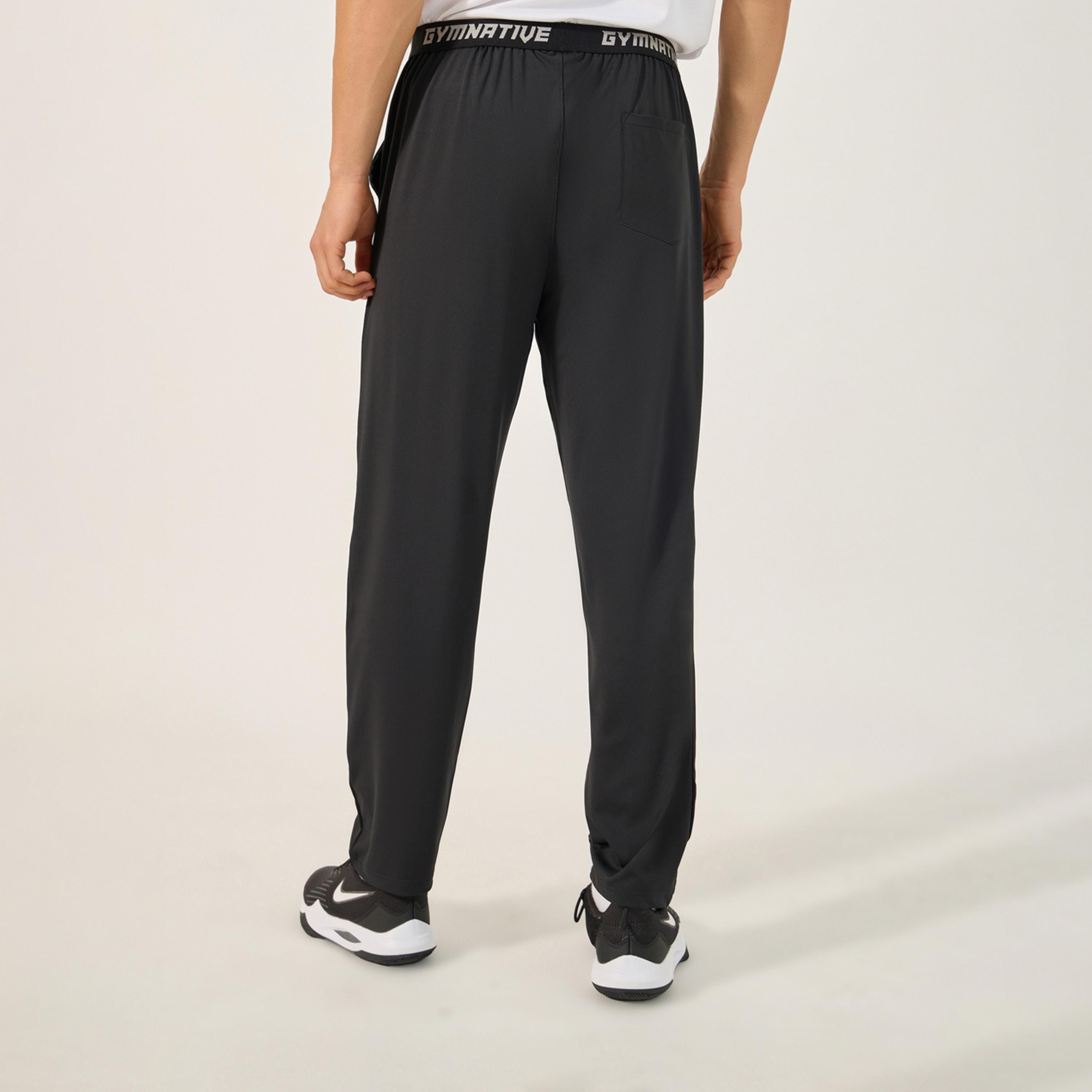 ستايلي - بنطال رياضي بقصّة نحيفة وتفاصيل شارة مع حزام خصر مطبوع-men-clothing-sportswearandactivewear-bottoms-image-5