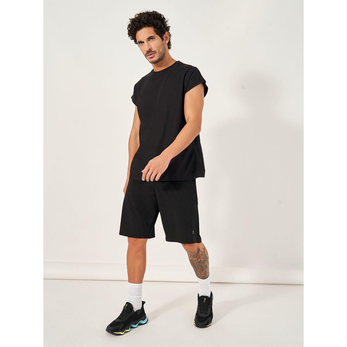 تيشيرت فضفاض بتفاصيل محبوكة وطبعة جرافيك-men-clothing-sportswearandactivewear-tshirtsandpolos-image-2