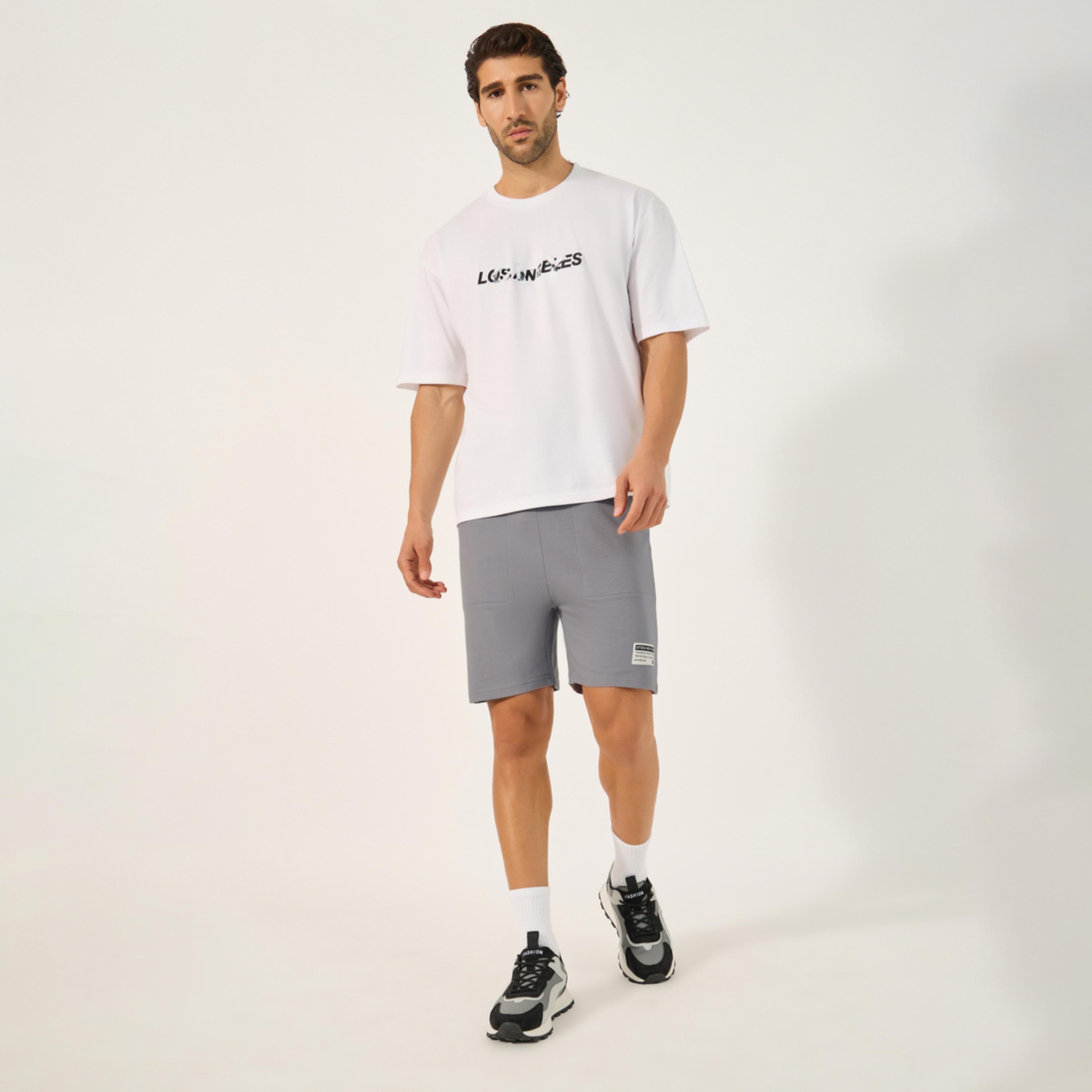 ستايلي - شورت رياضي صوف بقصّة عادية مع تفاصيل مرقعة-men-clothing-sportswearandactivewear-bottoms-image-2