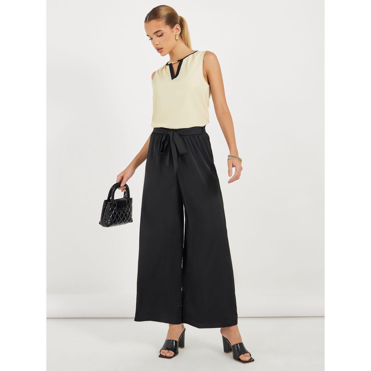 طقم منسق من بنطال بأرجل واسعة وبلوزة بلا أكمام-women-clothing-coordsets-image-1