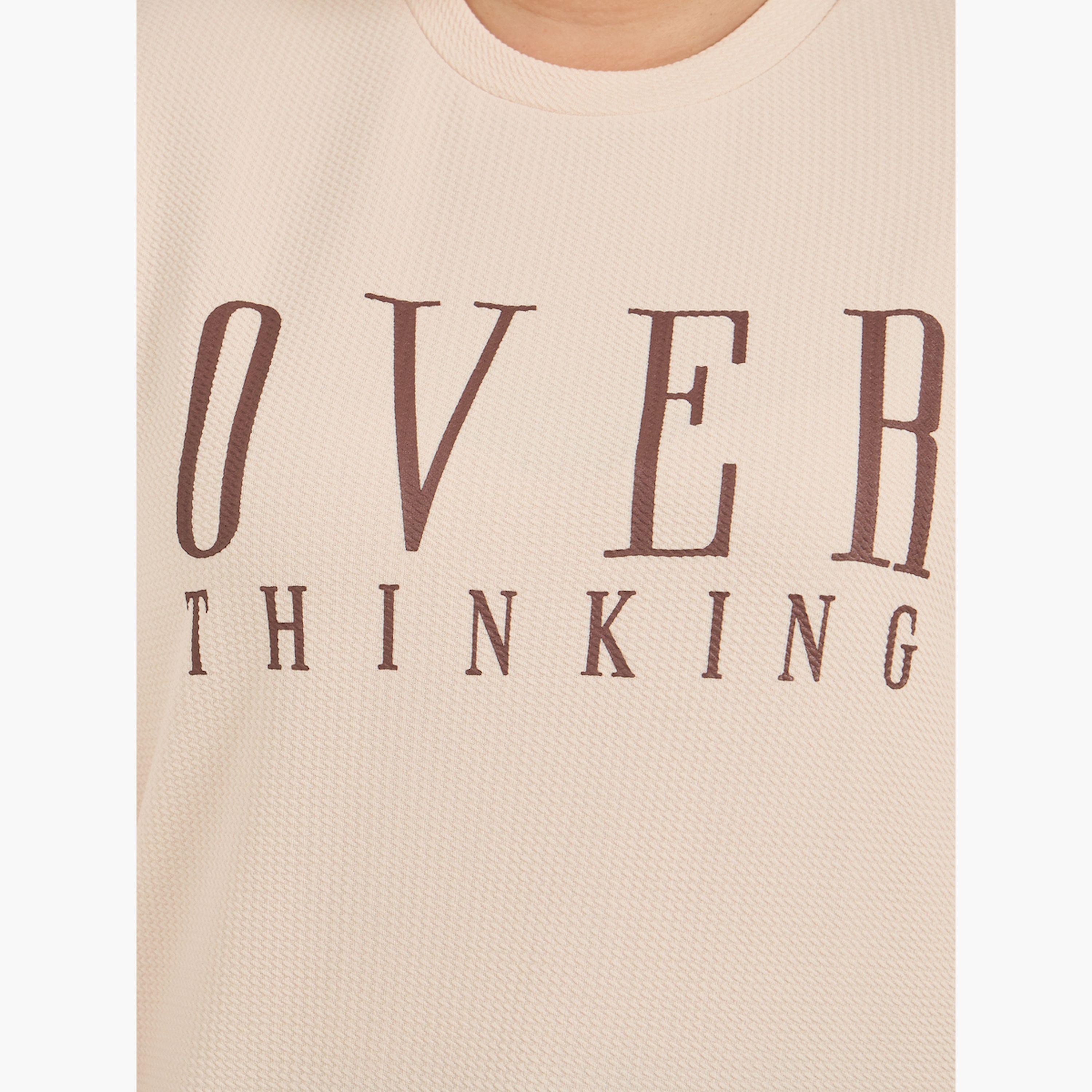 ستايلي - تي شيرت مقاس كبير مطبوع عليه شعار وأكتاف منسدلة-women-clothing-tshirts-image-3